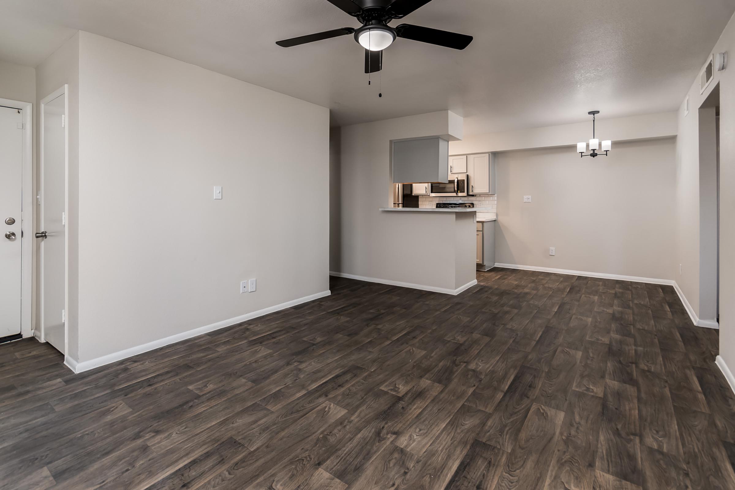 Updated Apartment with Wood-Style Flooring - Glenridge Apartments - Glendale - Arizona