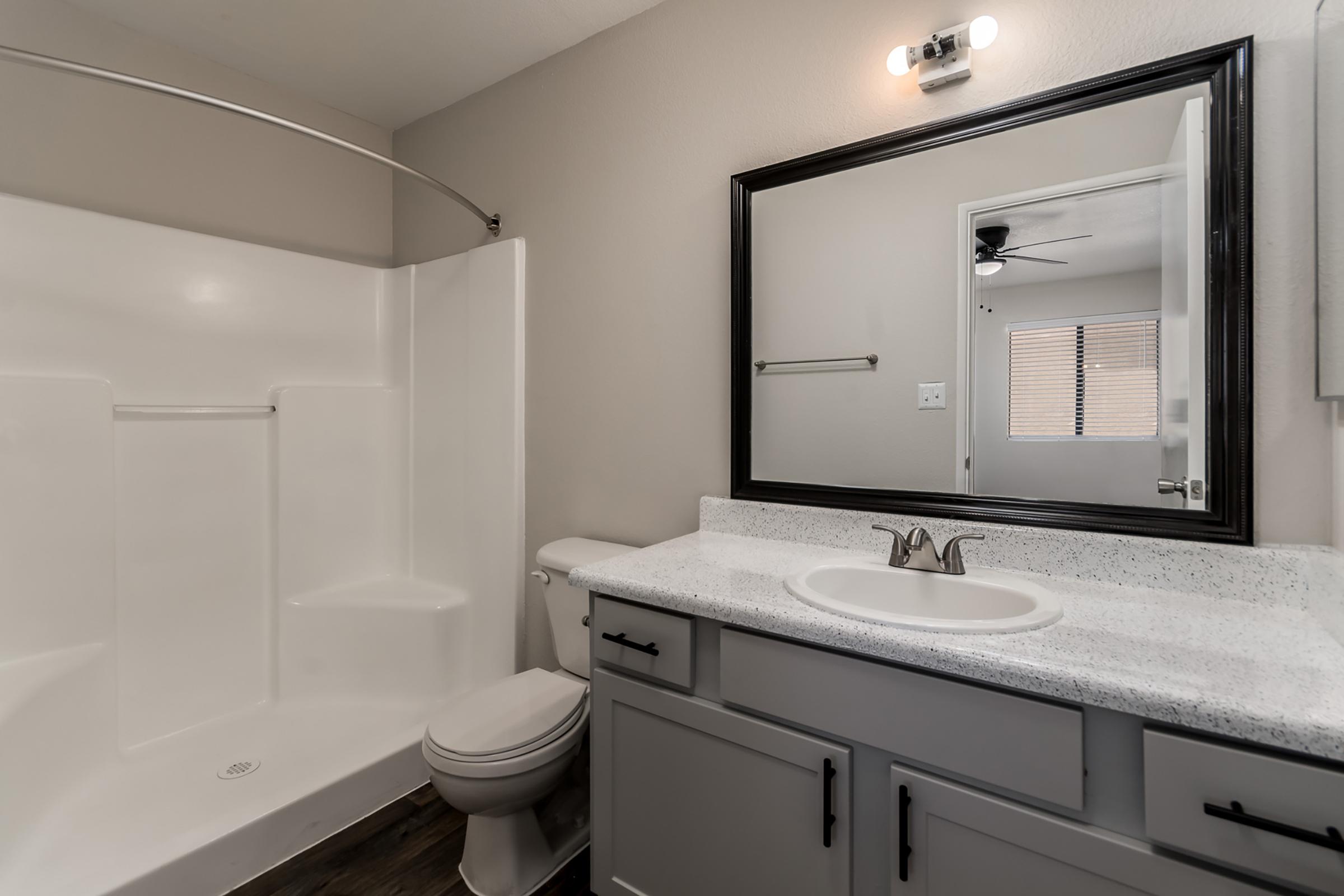 Bathroom with Ample Storage - Glenridge Apartments - Glendale - Arizona