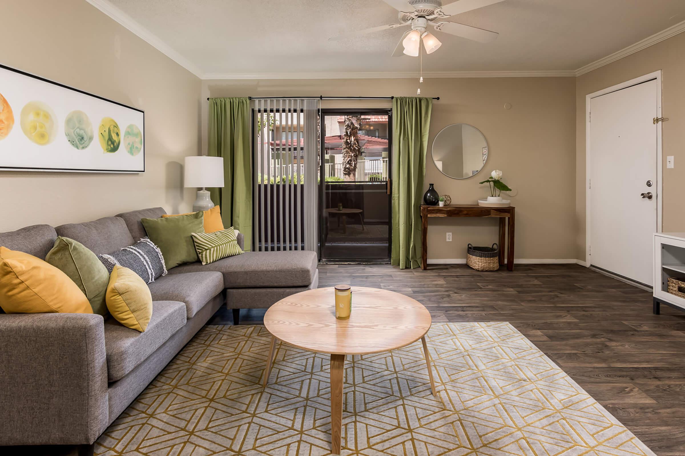 Living Room with Sliding Doors to Patio - Glenridge Apartments - Glendale - Arizona
