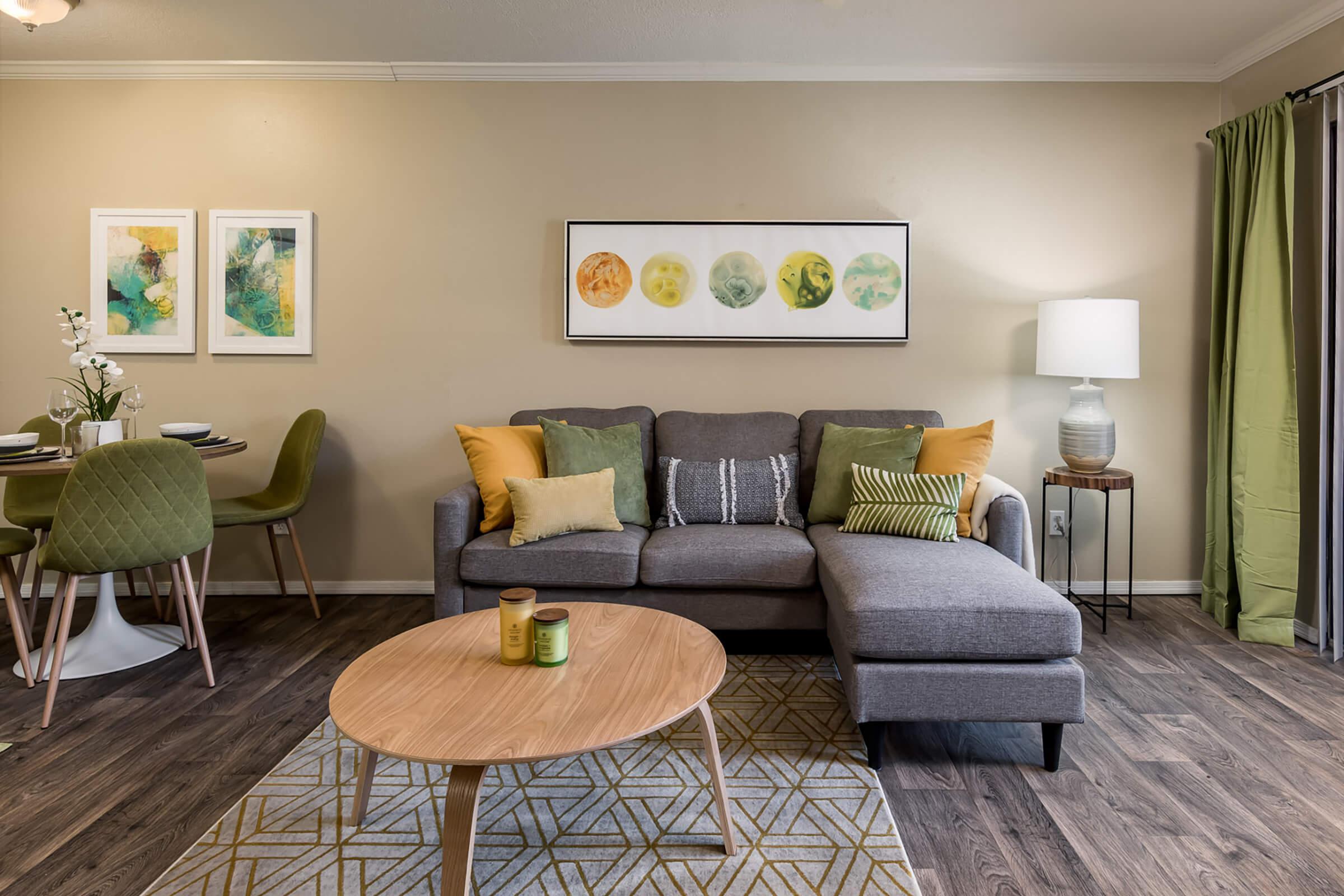 Updated Living Space with Wood-Style Flooring - Glenridge Apartments - Glendale - Arizona