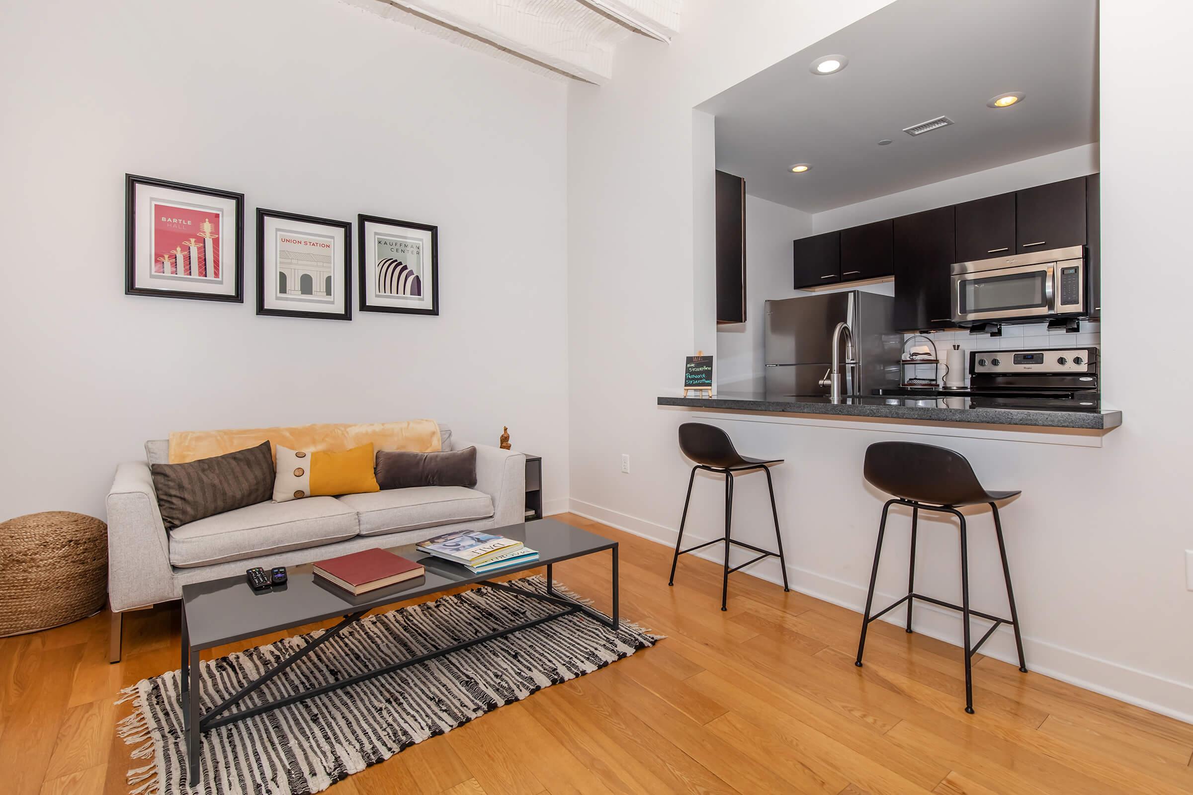 a living room with a wooden floor