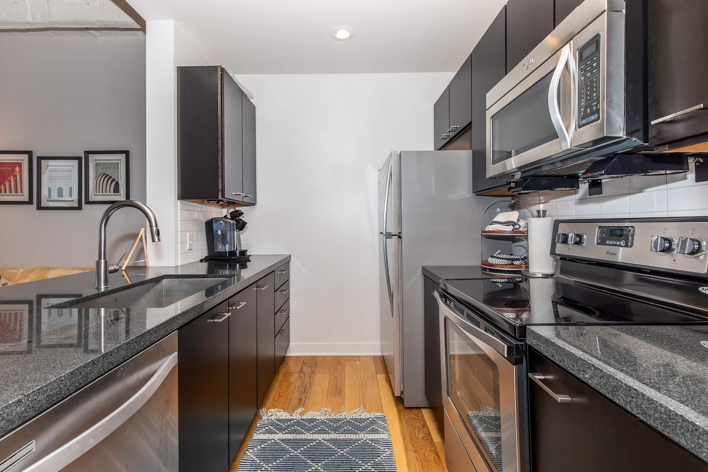 a modern kitchen with stainless steel appliances