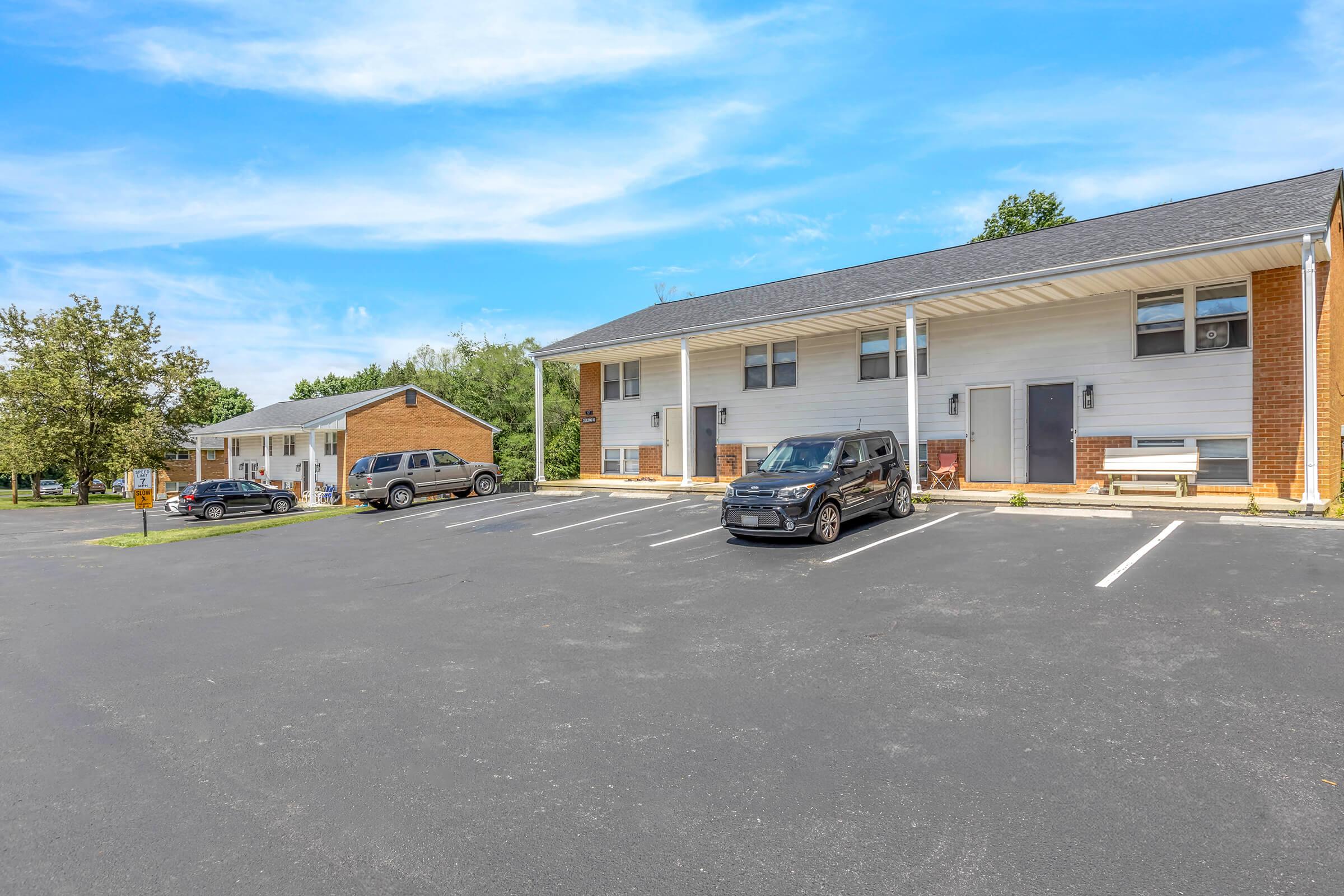 a small house in a parking lot