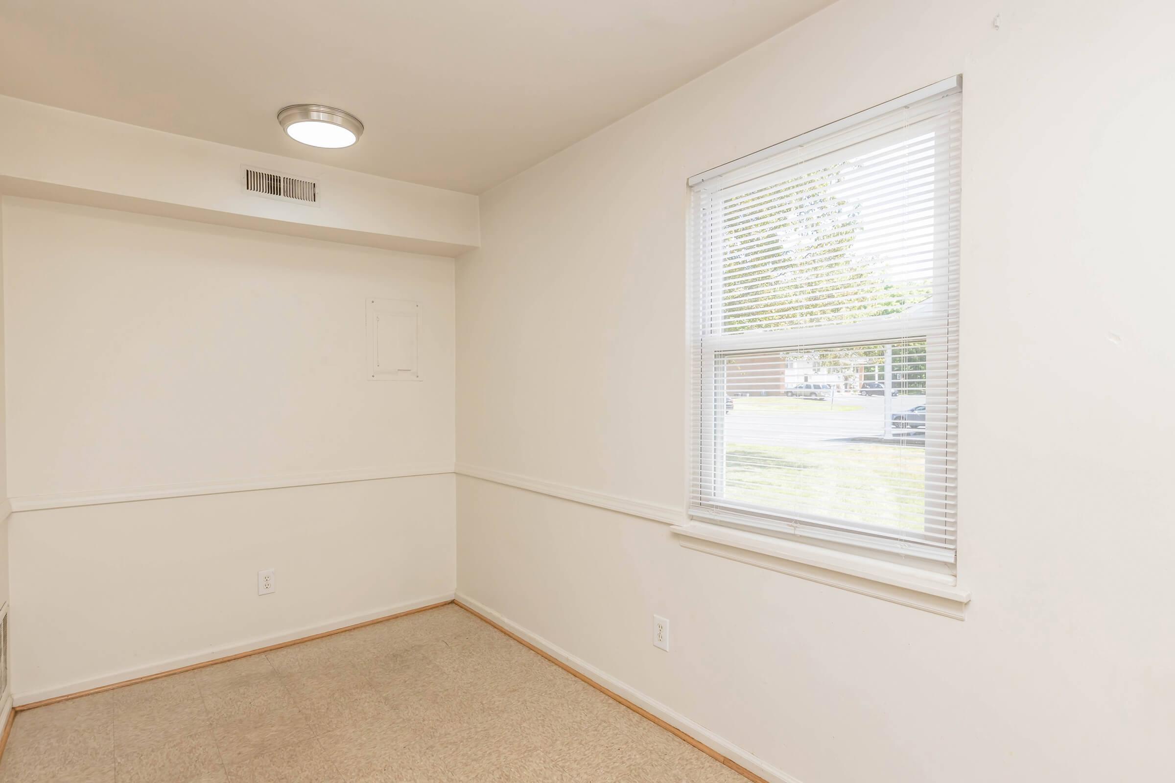 a kitchen with a sink and a window