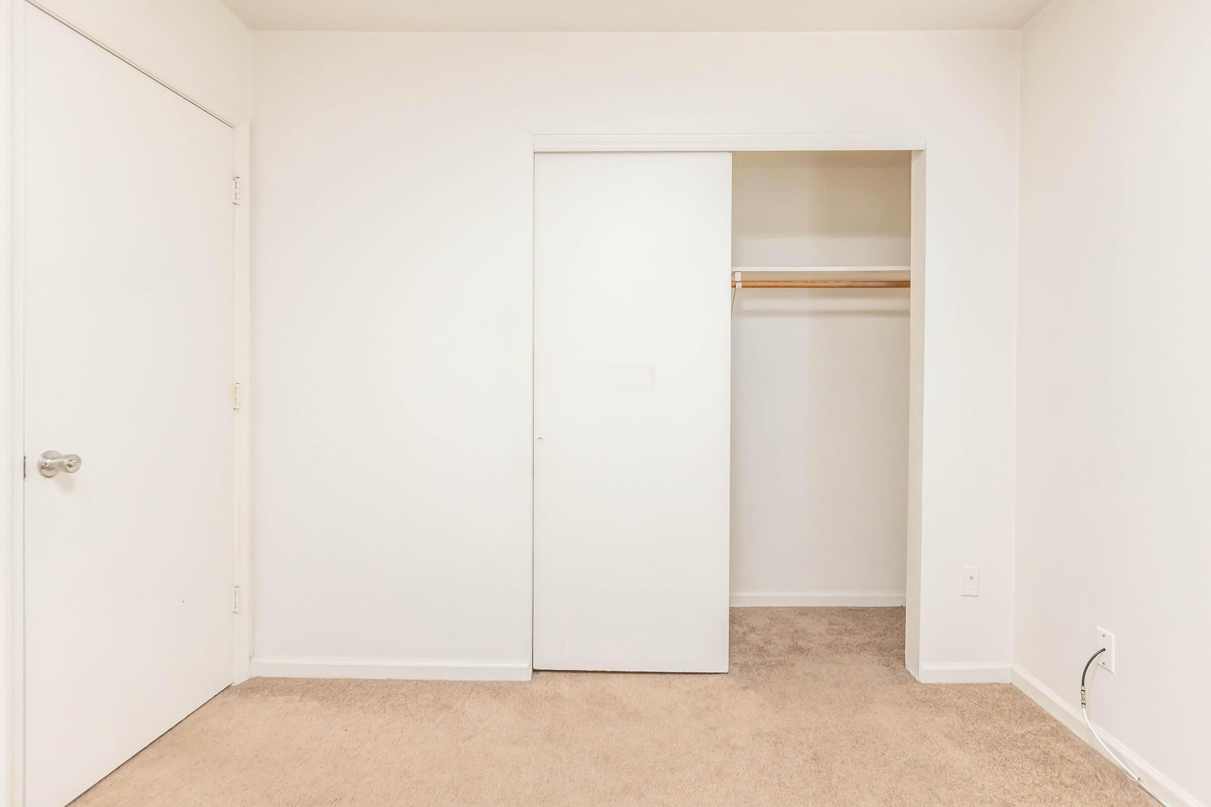 a refrigerator freezer sitting inside of a building