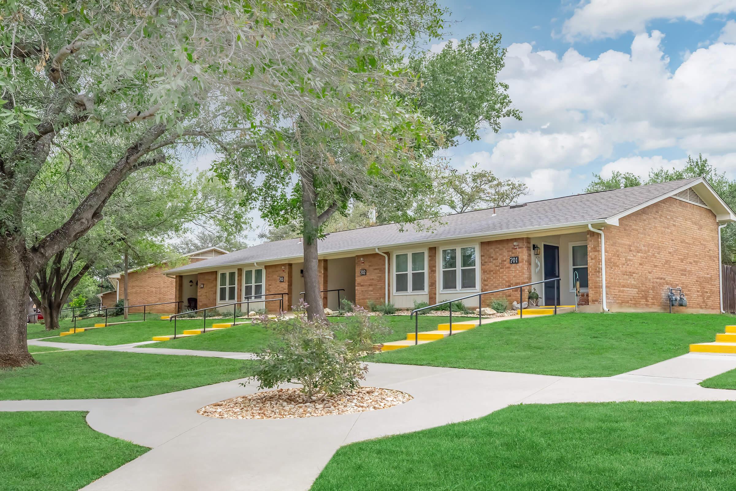 a large lawn in front of a house