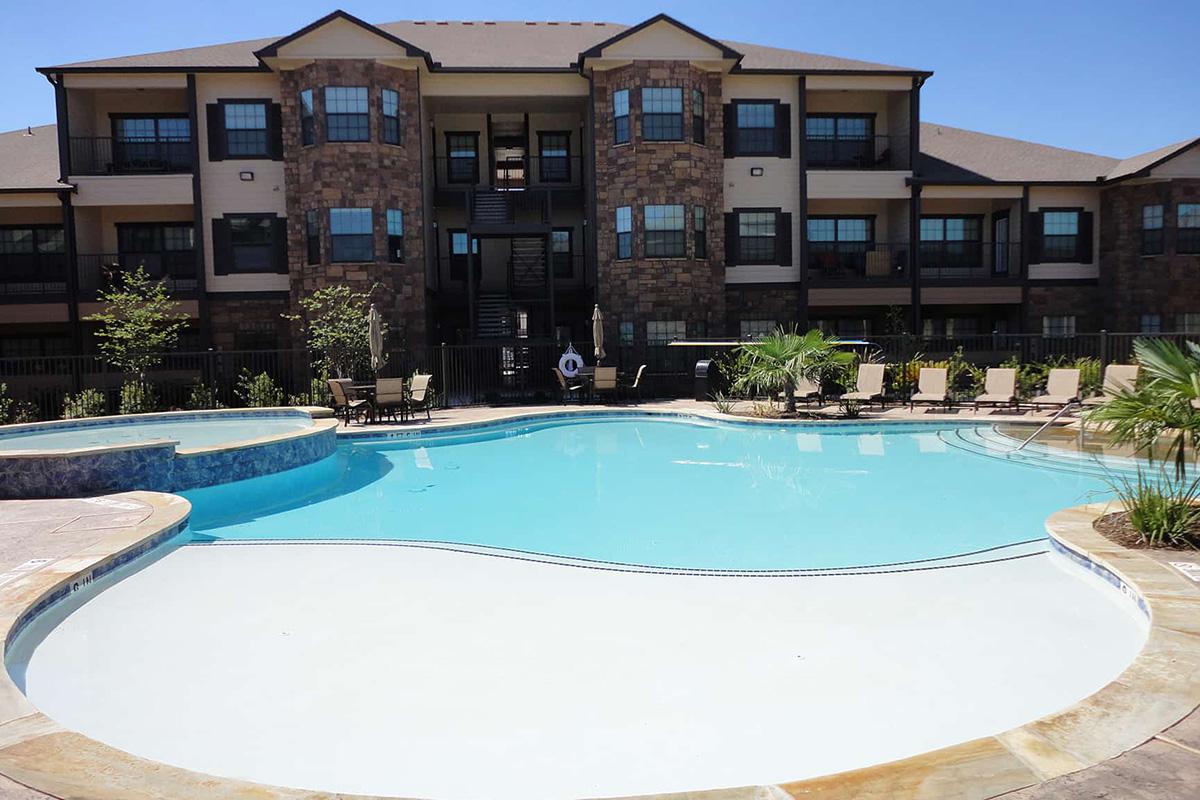 a pool next to a building