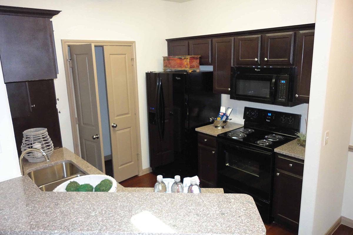 a room filled with furniture and a stove