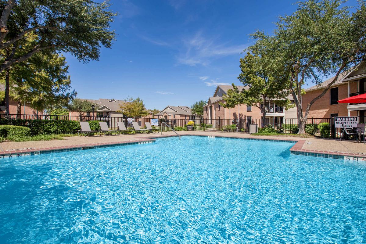 a pool next to a body of water