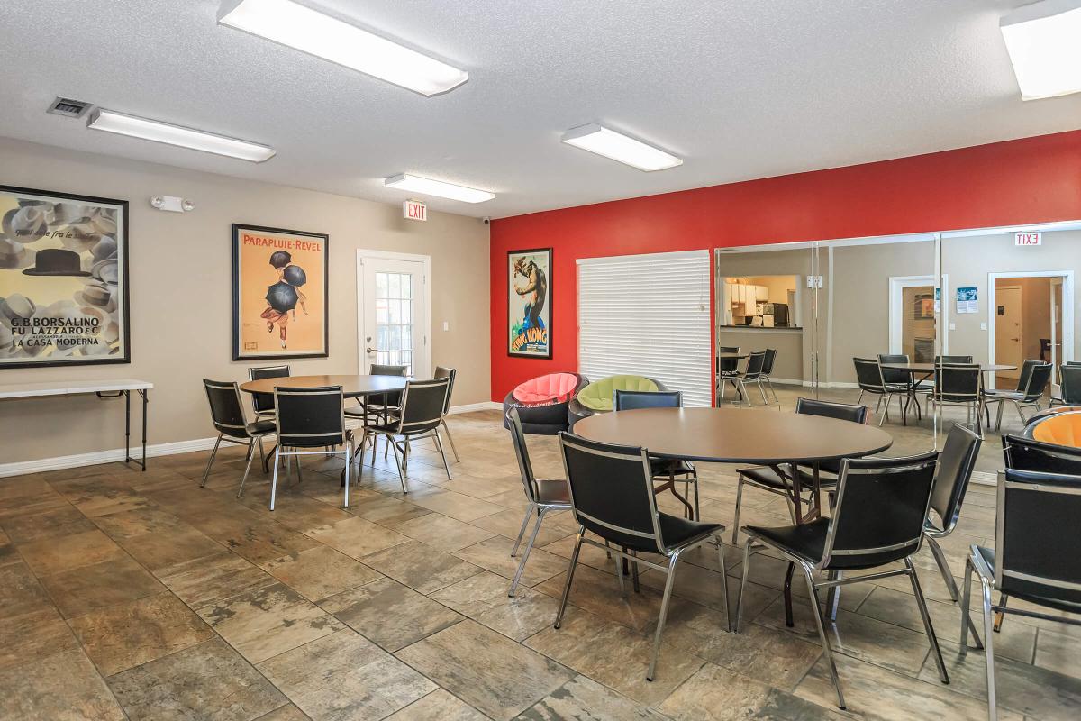 a room filled with furniture and a table