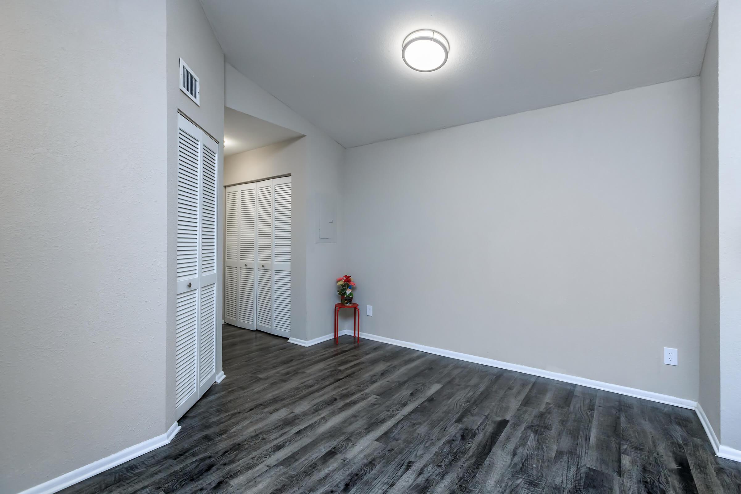 a white refrigerator freezer sitting in a room