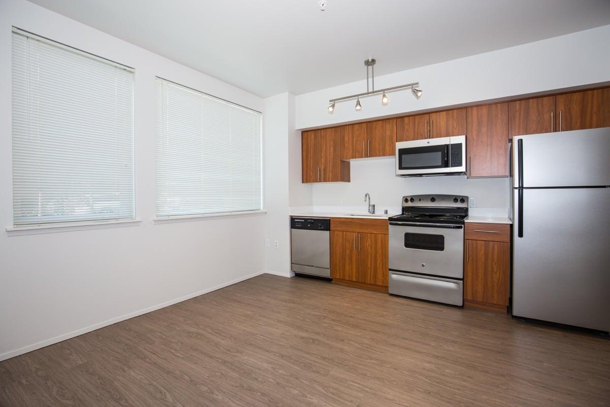 a kitchen with a wood floor