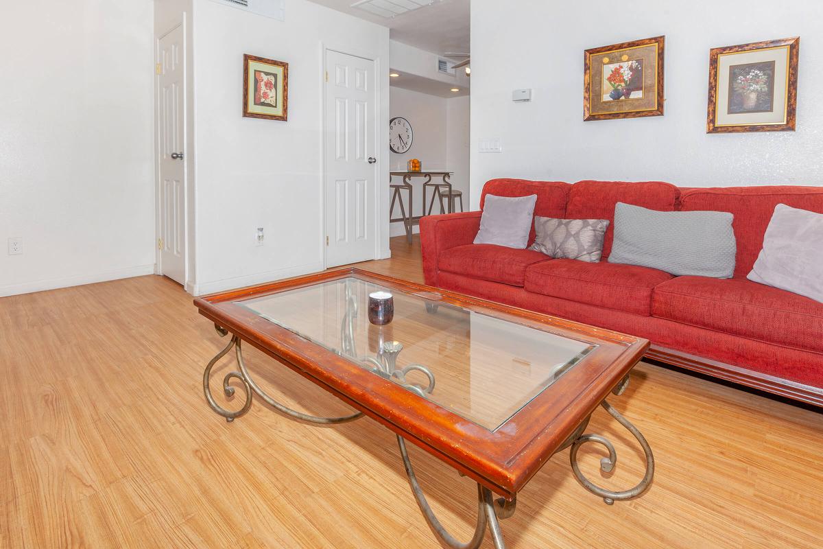 a living room with a wooden floor