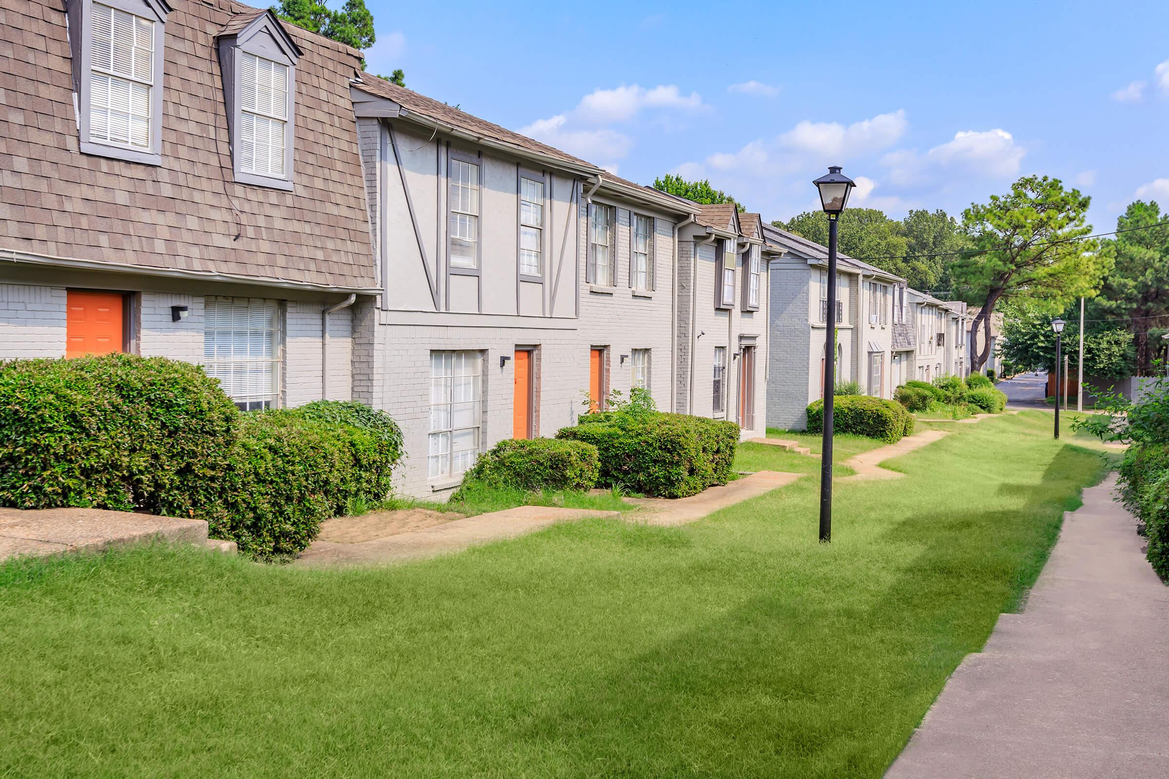 a large lawn in front of a house