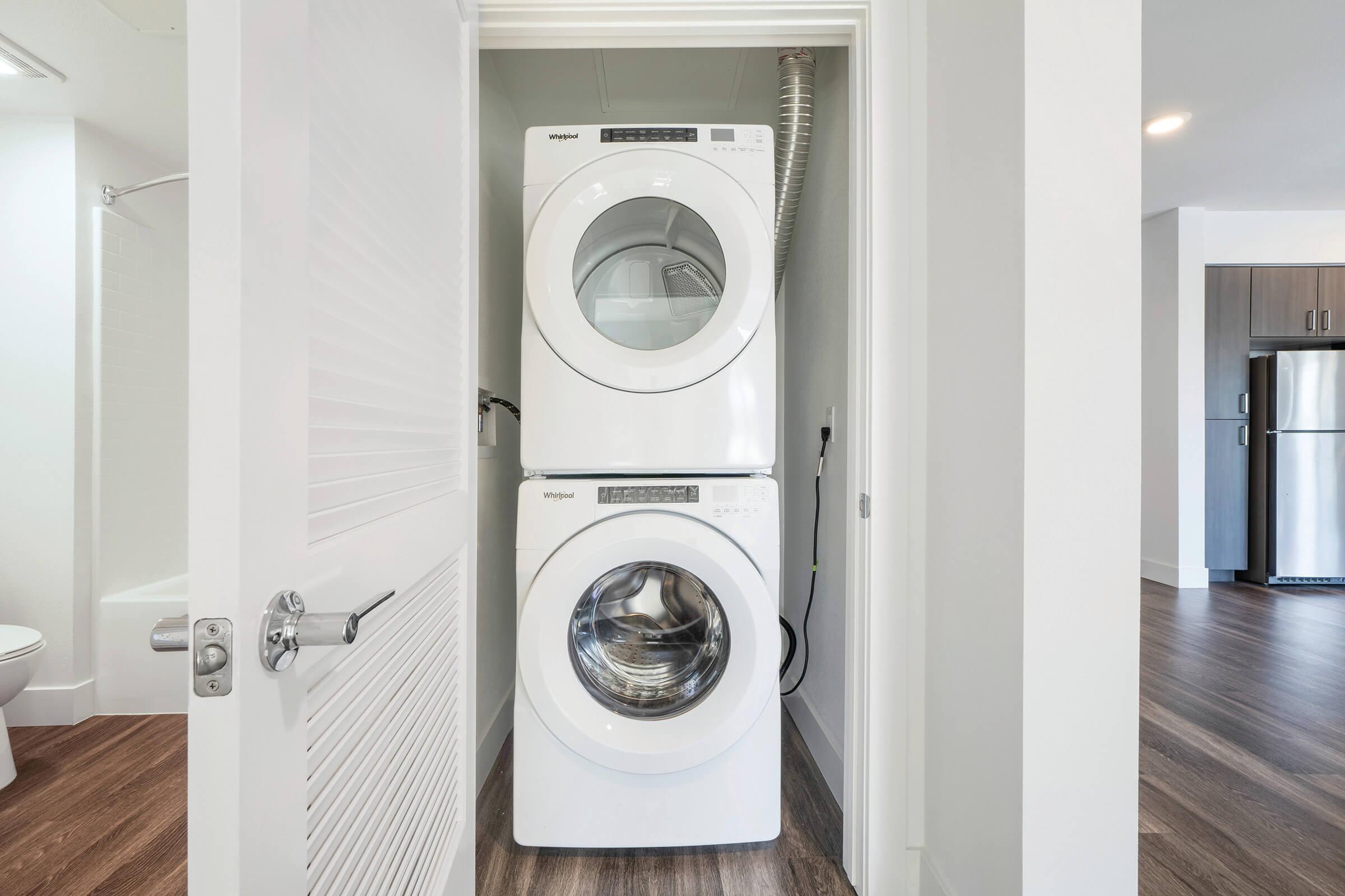 Full-size washer and dryer in closet