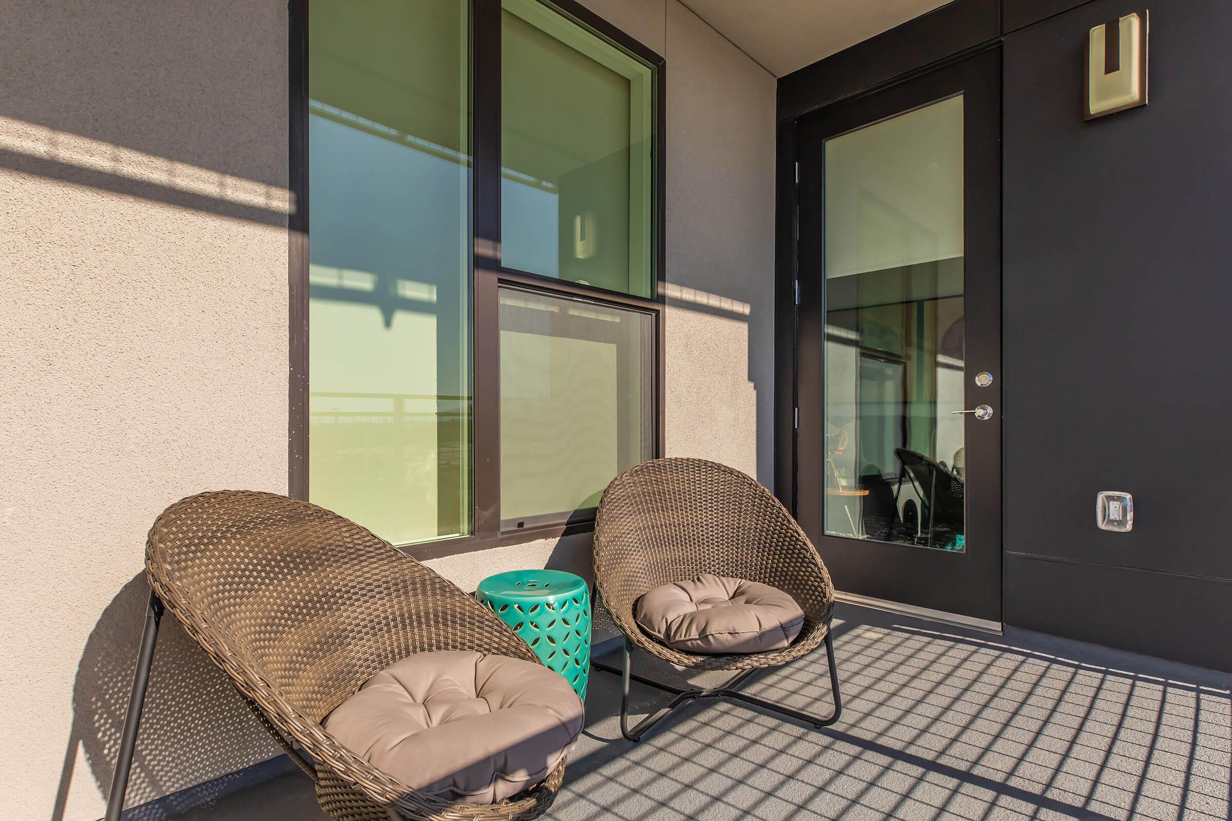 Patio with brown chairs