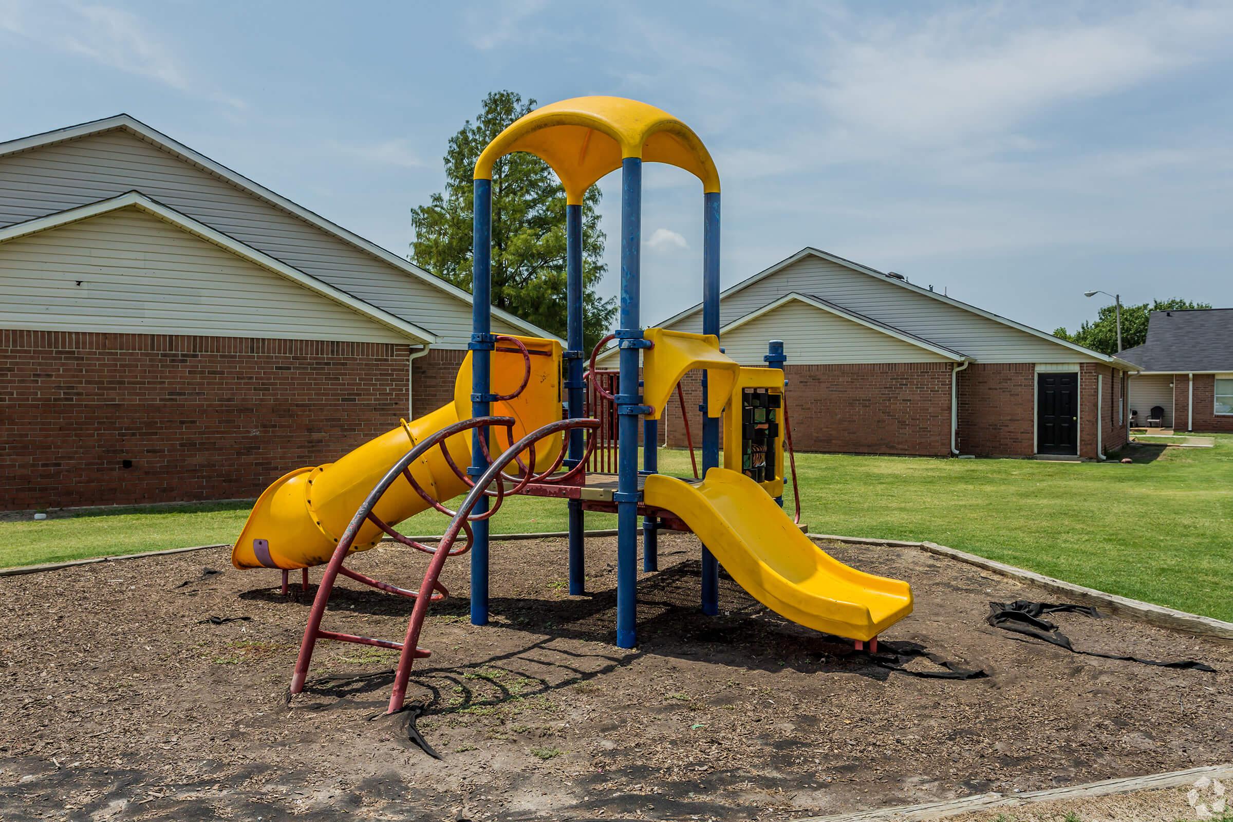 a playground in front of a building