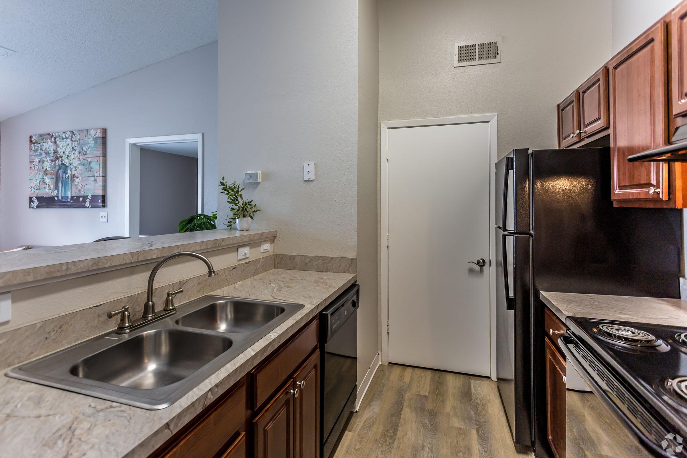 a modern kitchen with stainless steel appliances