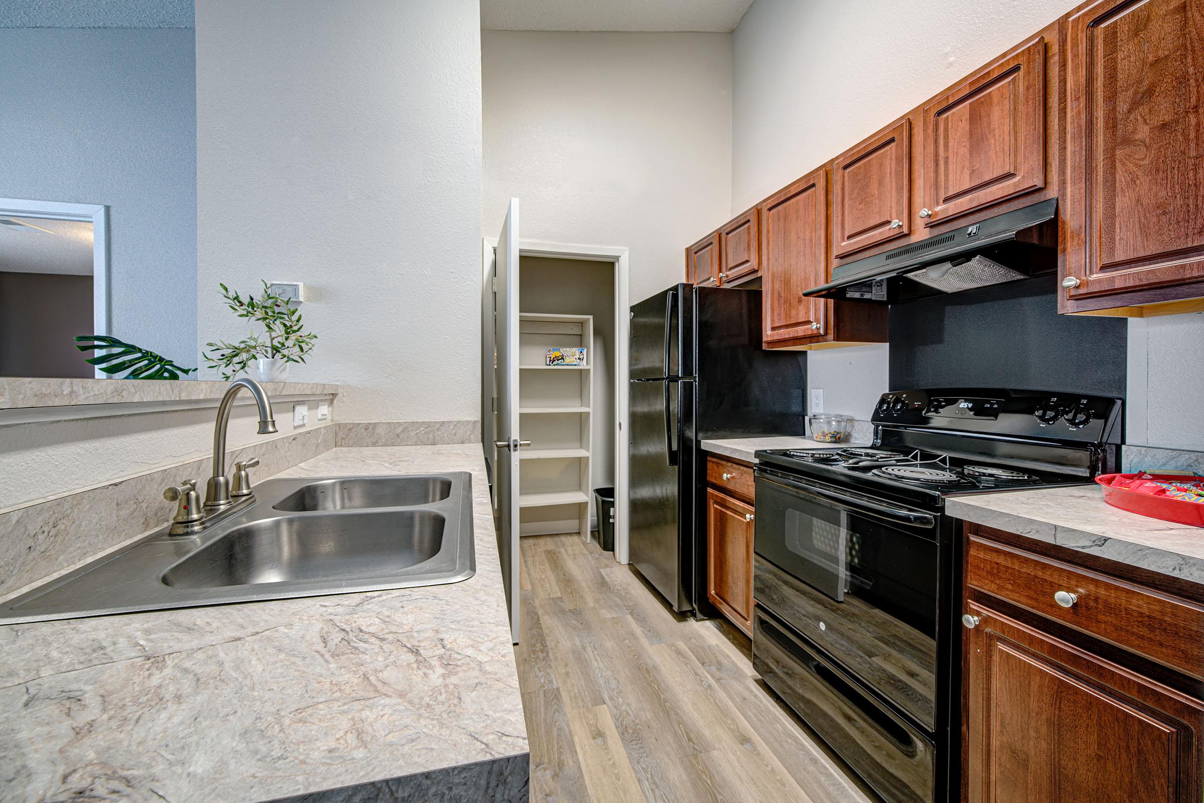 a modern kitchen with stainless steel appliances