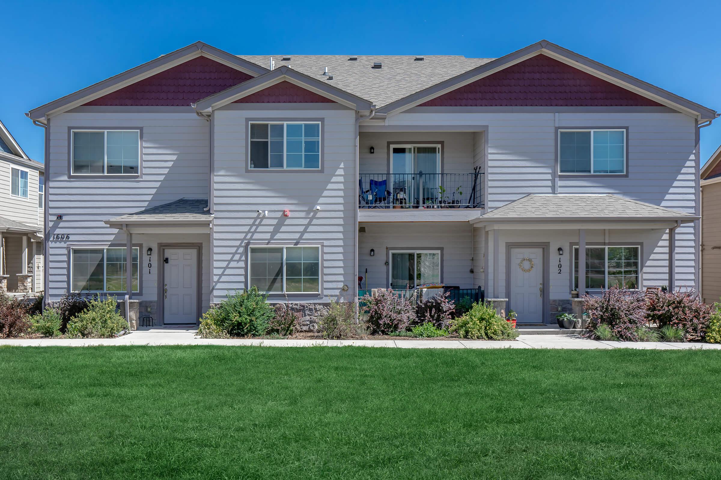 a large lawn in front of a house