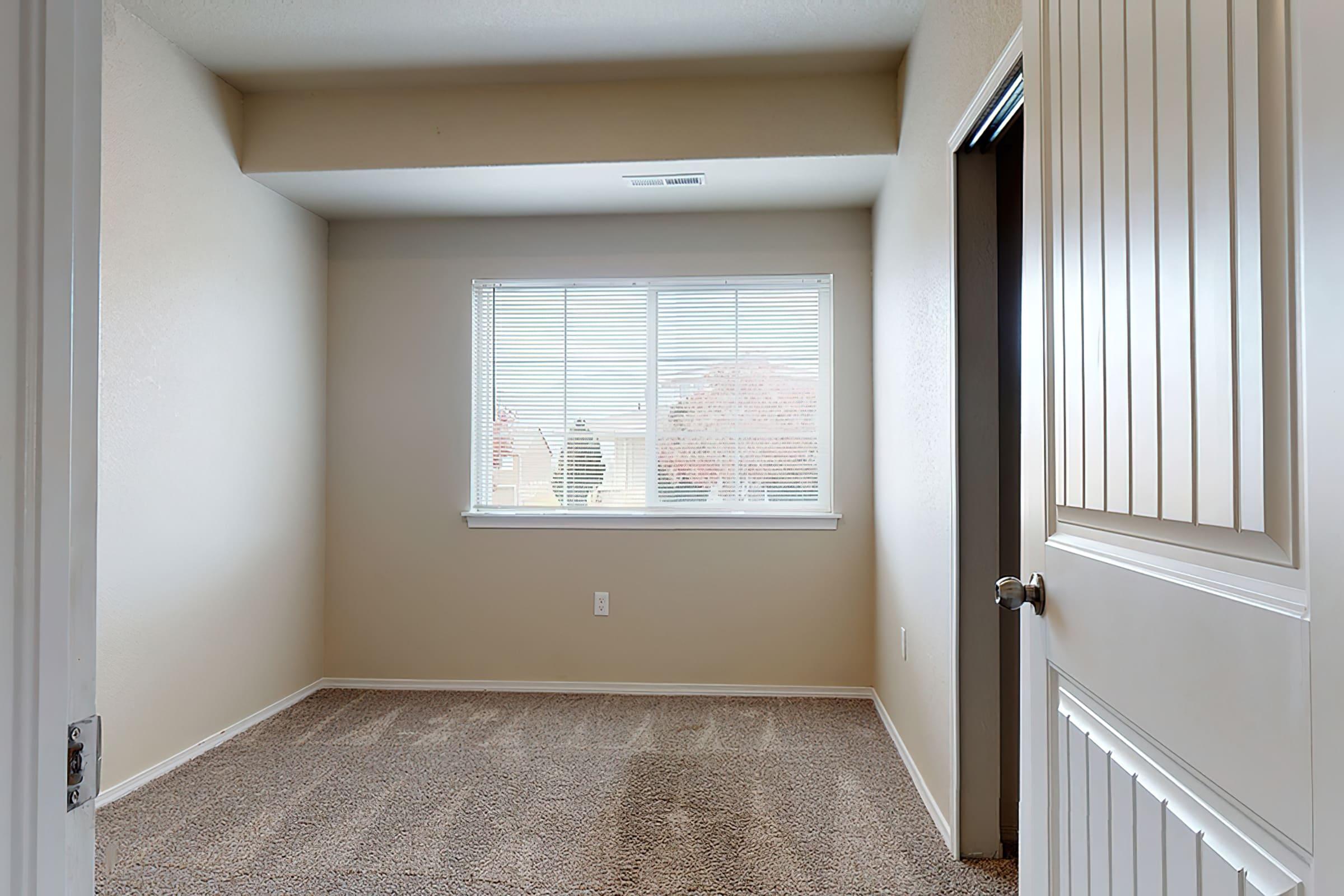 a room with a sink and a window