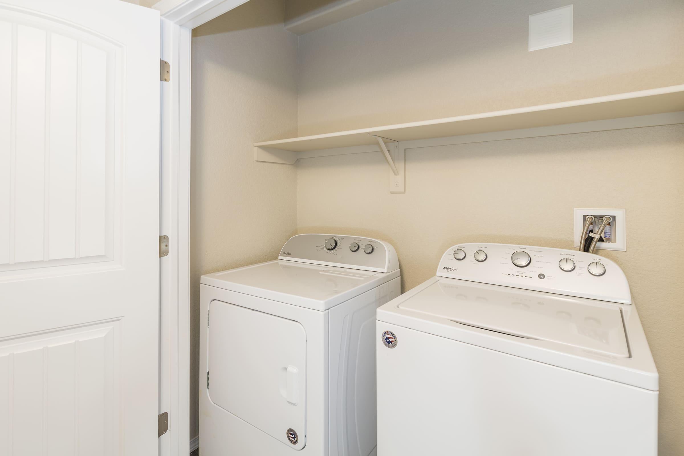 a refrigerator freezer sitting in a room