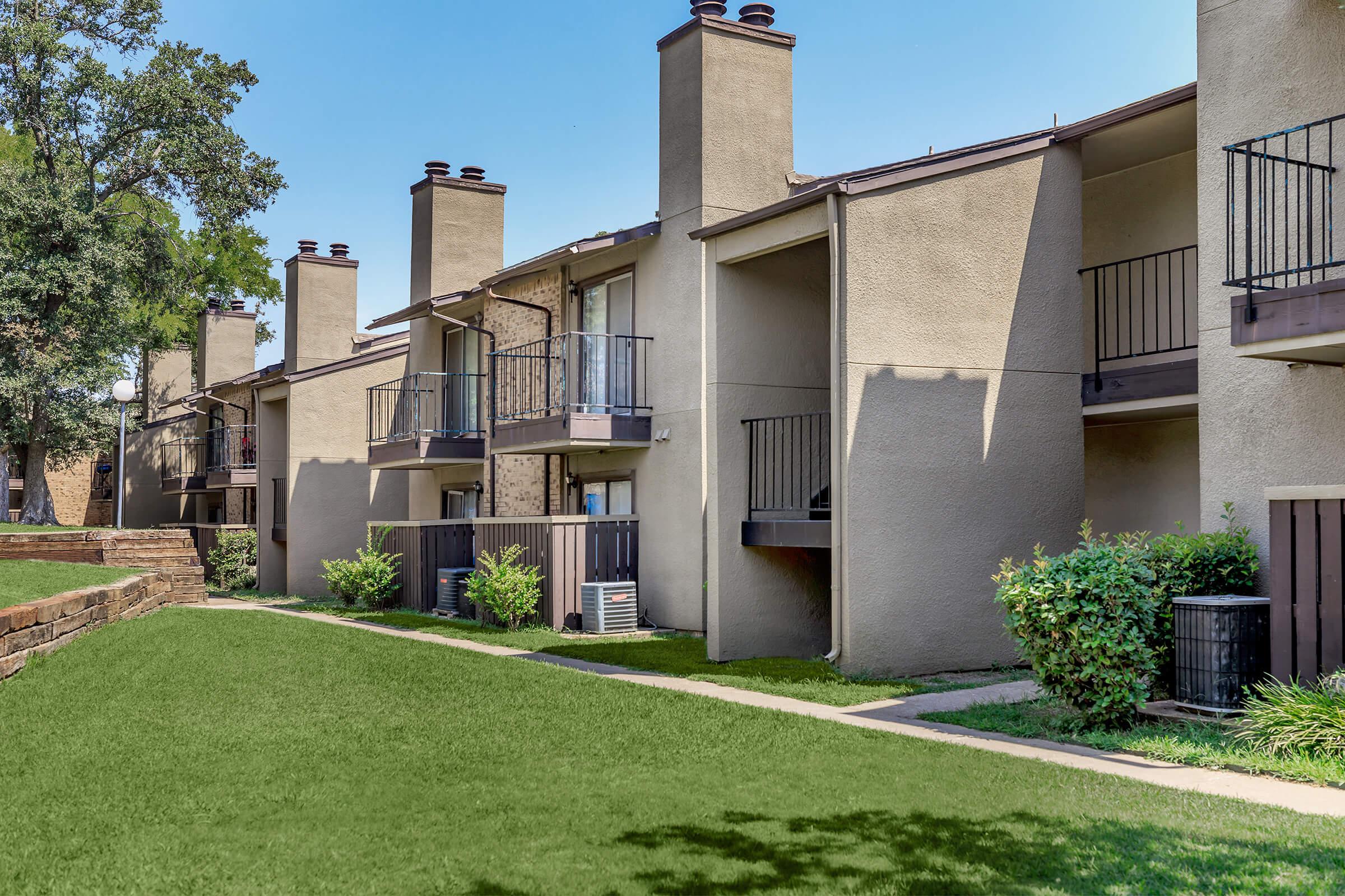 a large lawn in front of a house