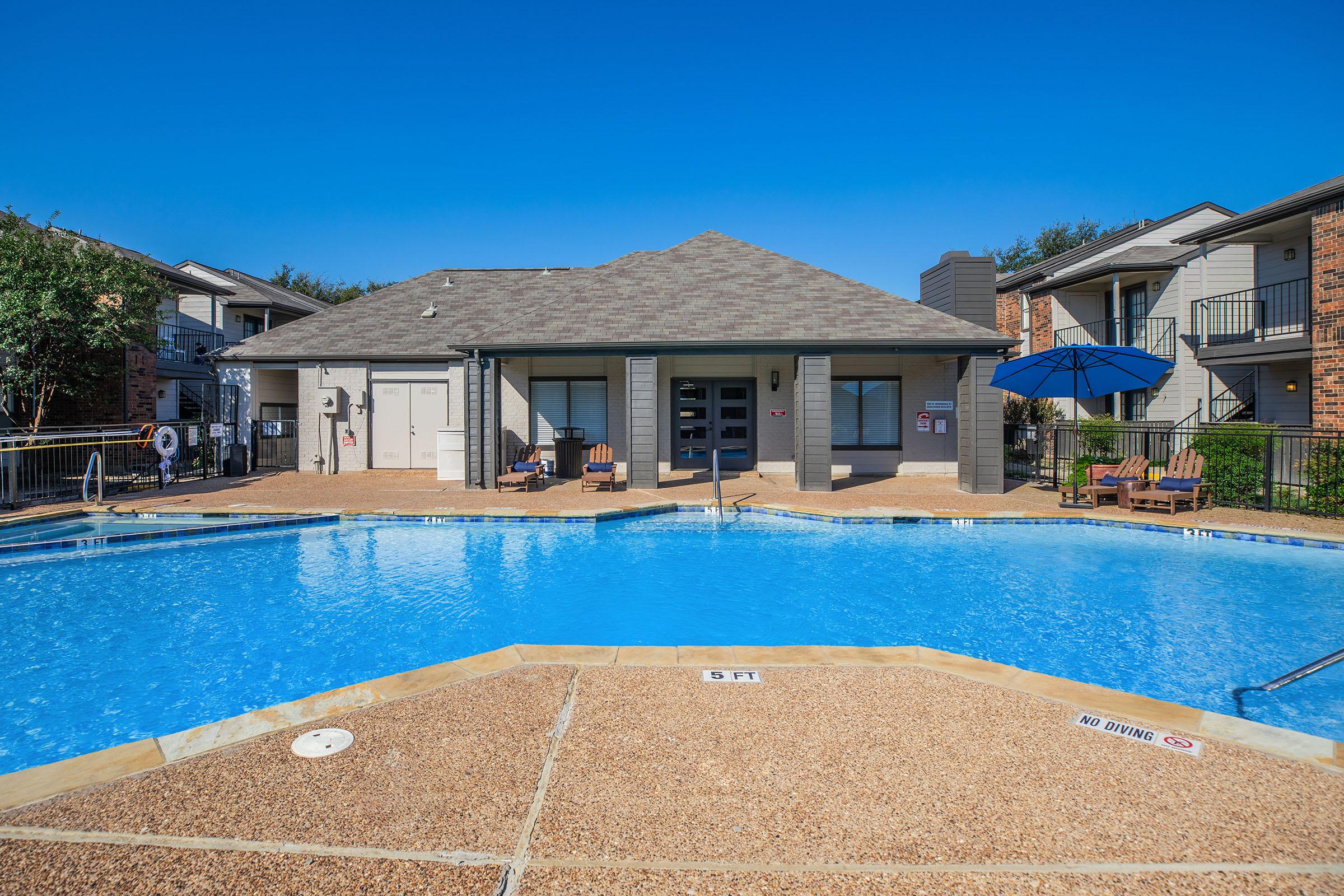 a small house in a pool of water