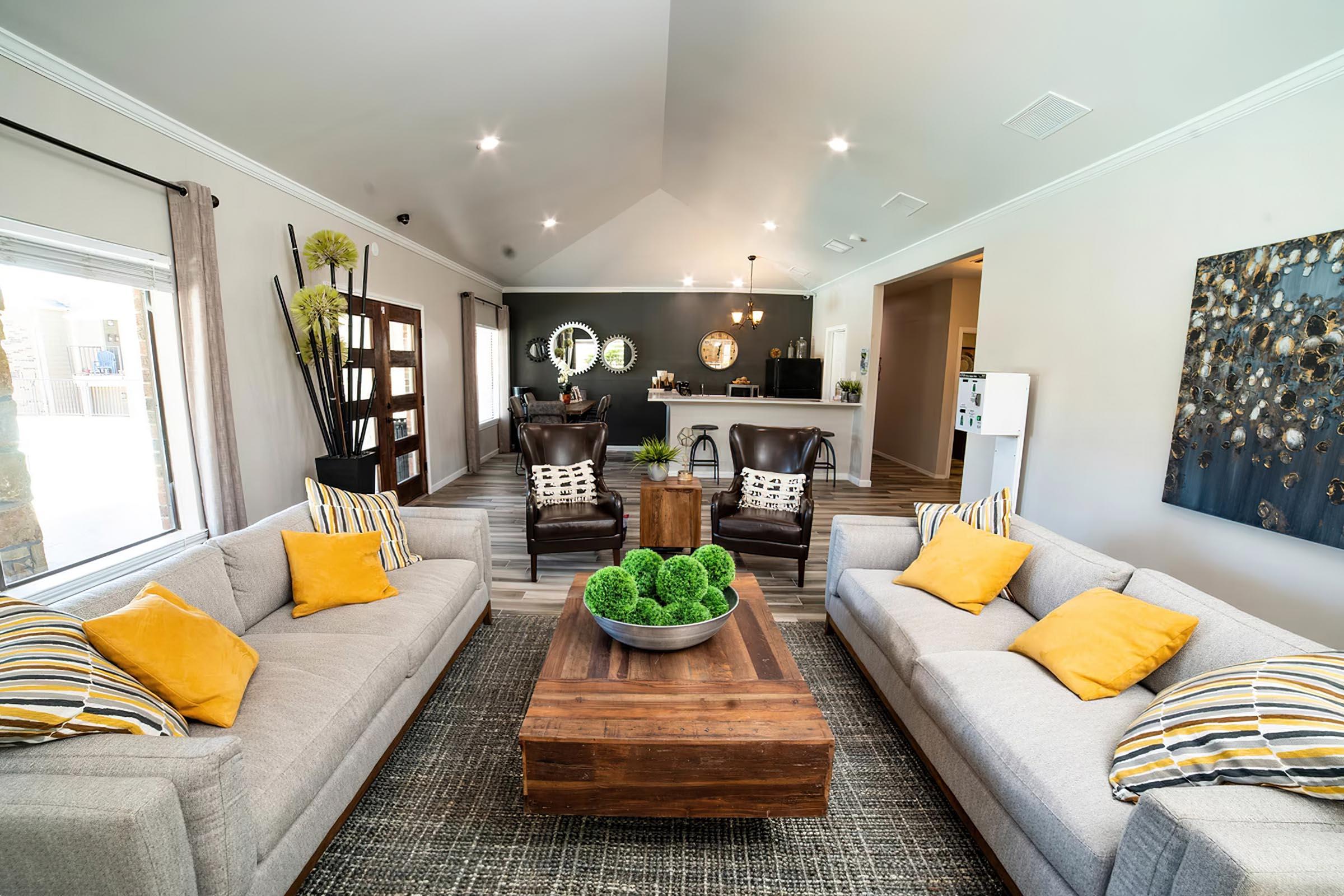 a living room with a couch and a table