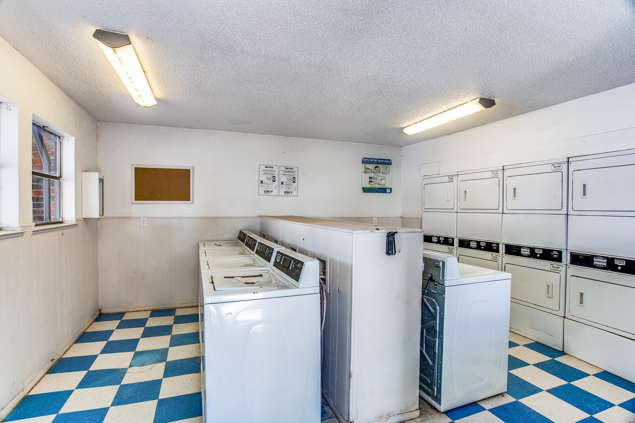 a kitchen with a tile floor