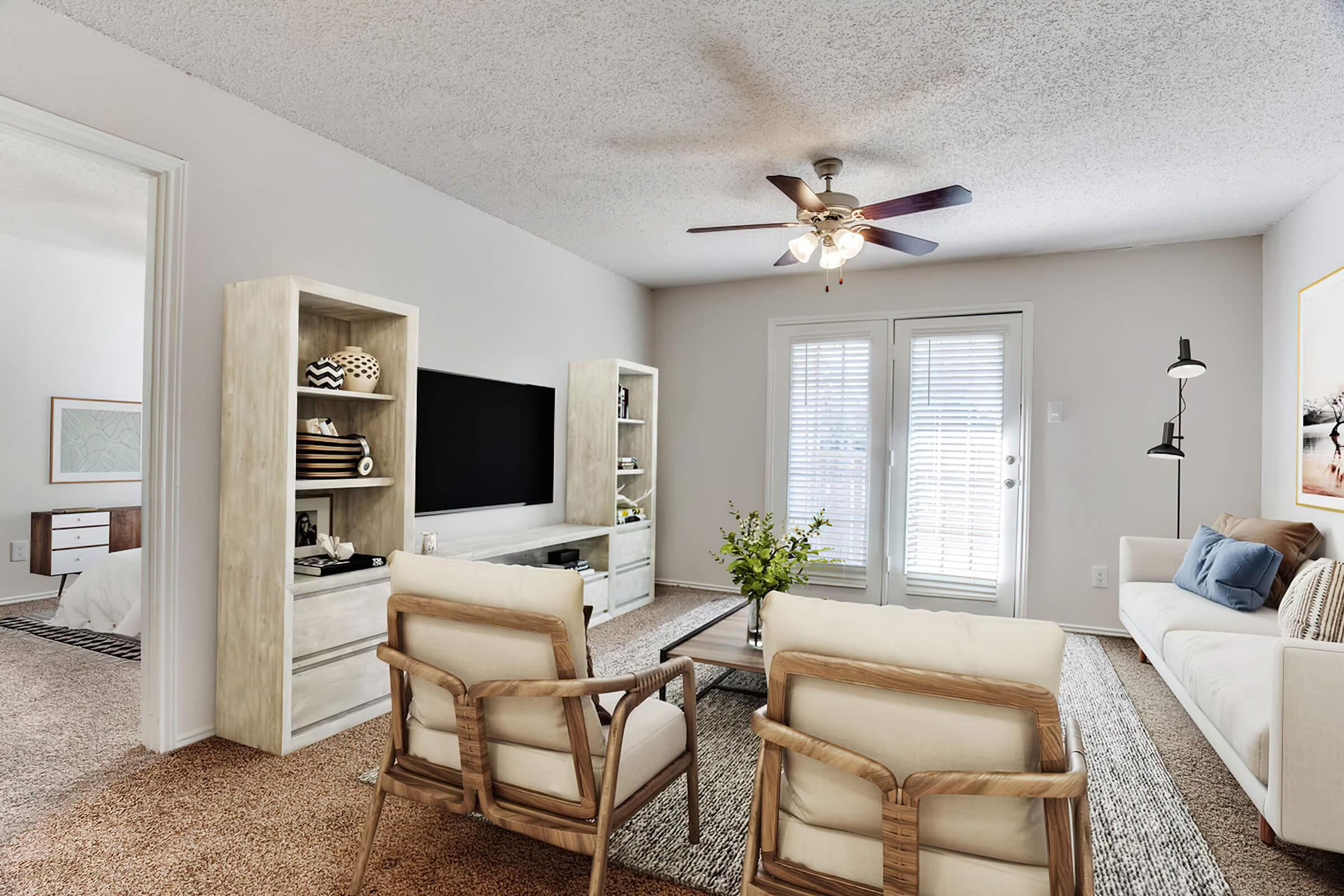 a living room filled with lots of furniture