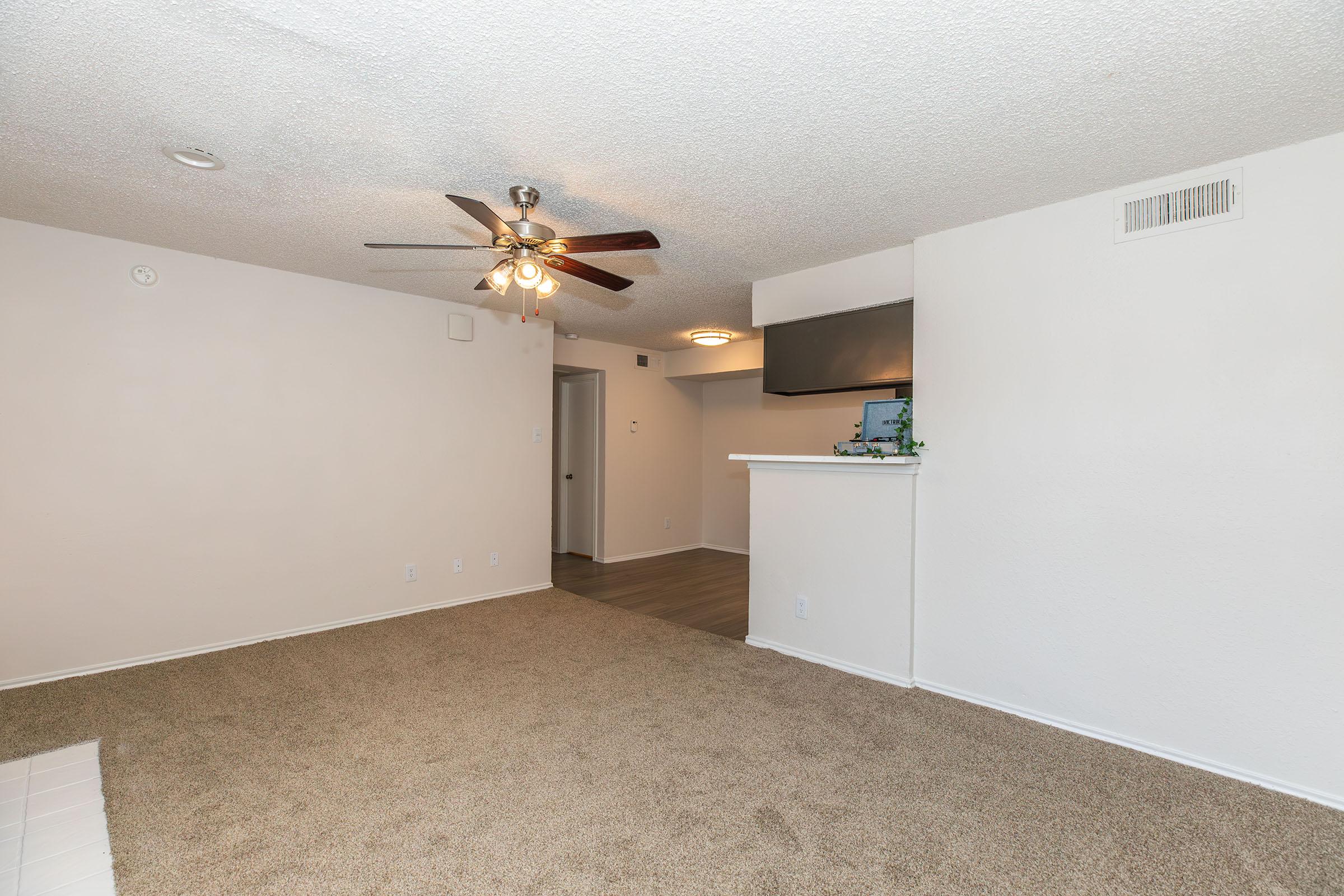 a kitchen with a sink and a refrigerator