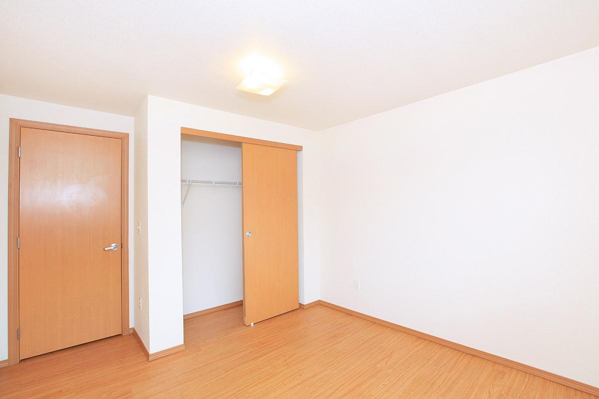 a kitchen with a wood floor