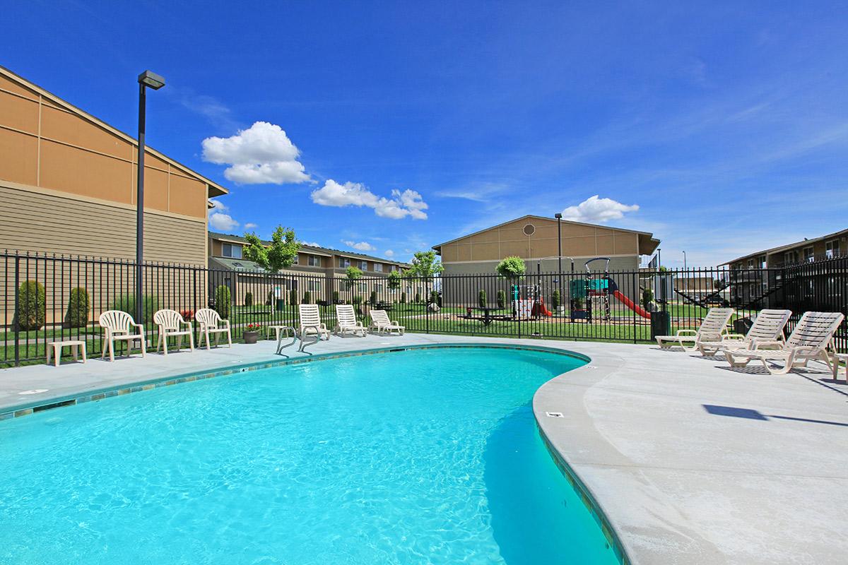 a pool next to a body of water