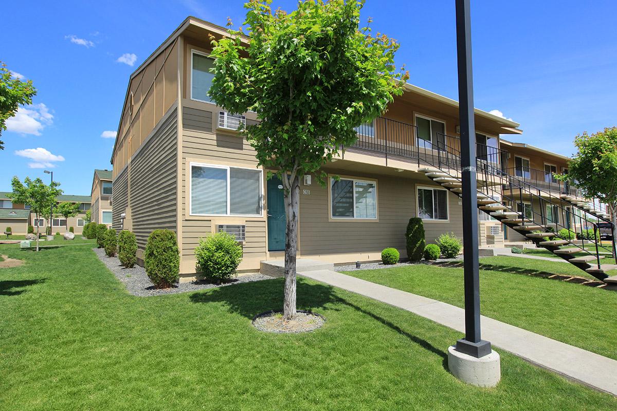 a large lawn in front of a building