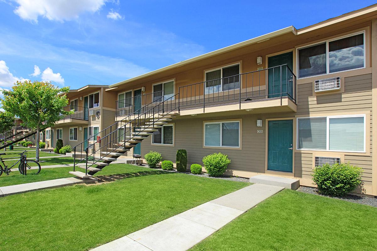 a large lawn in front of a house