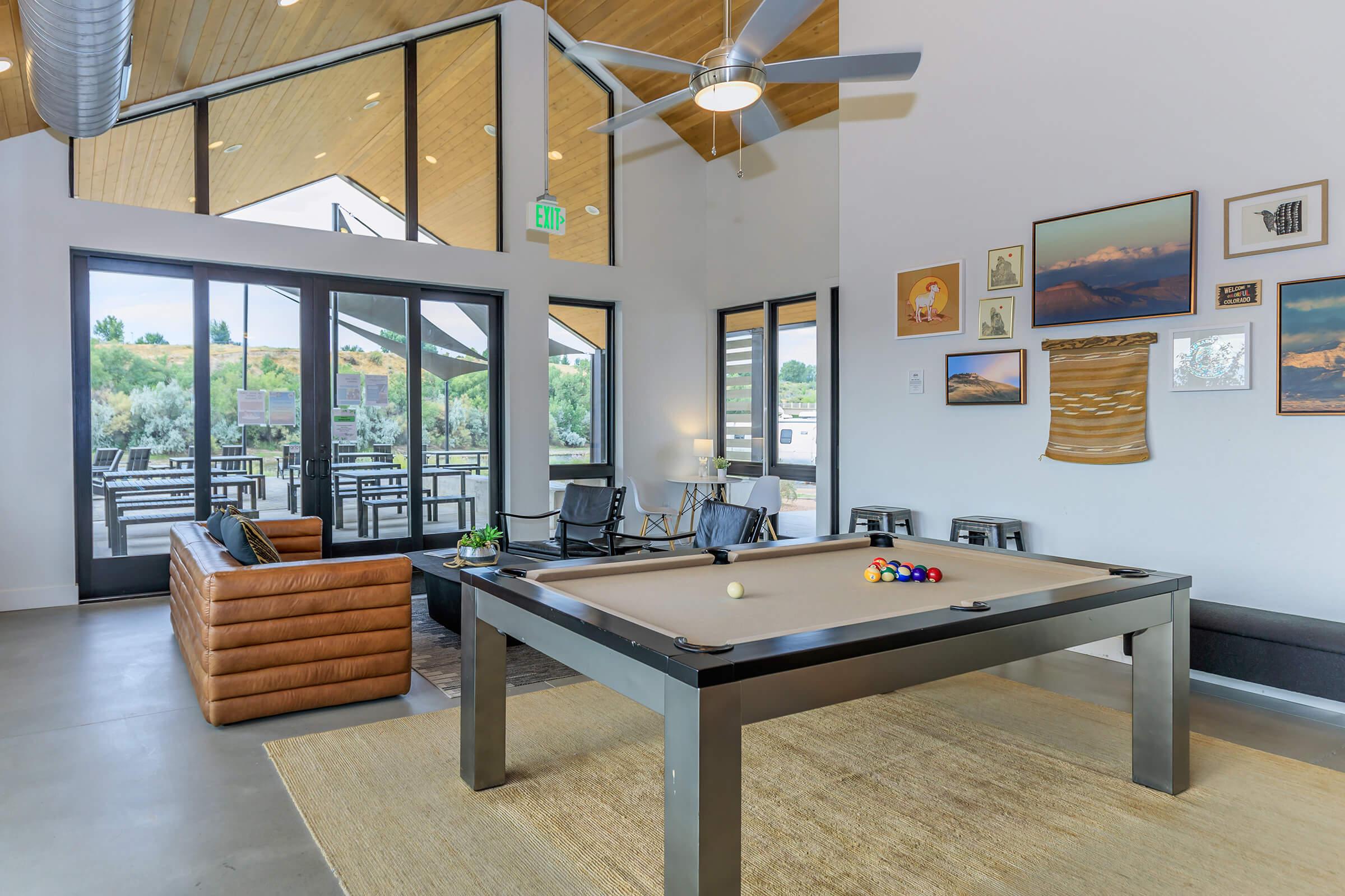 a kitchen with a table in a room