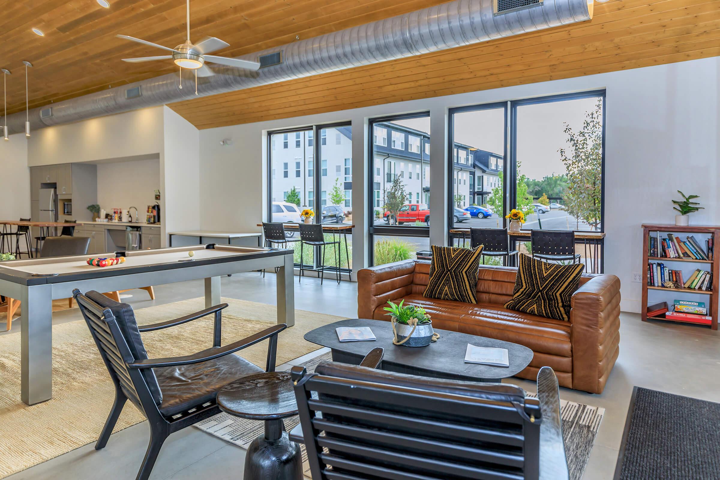 a room filled with furniture and a fireplace