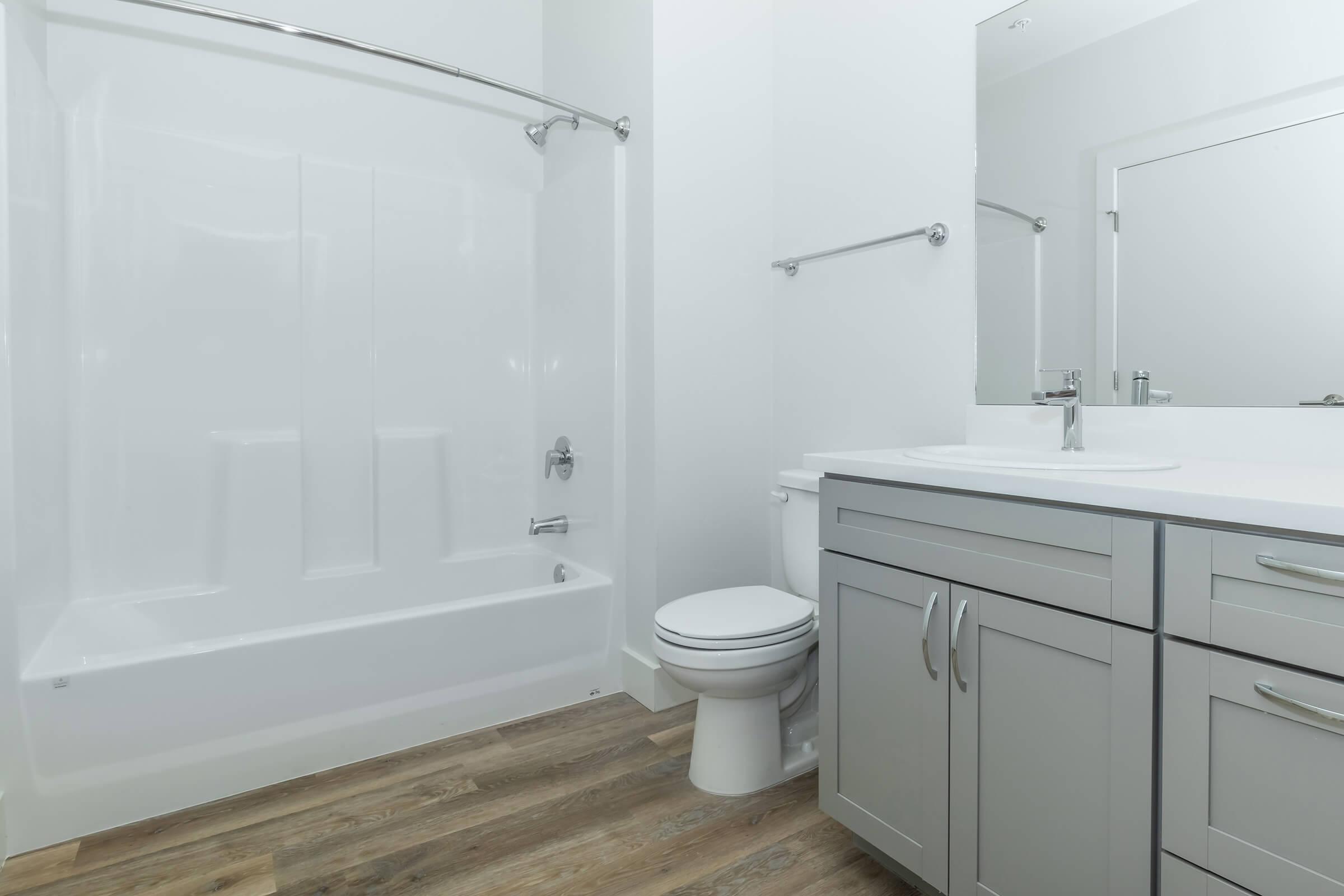 a room with a sink and a shower