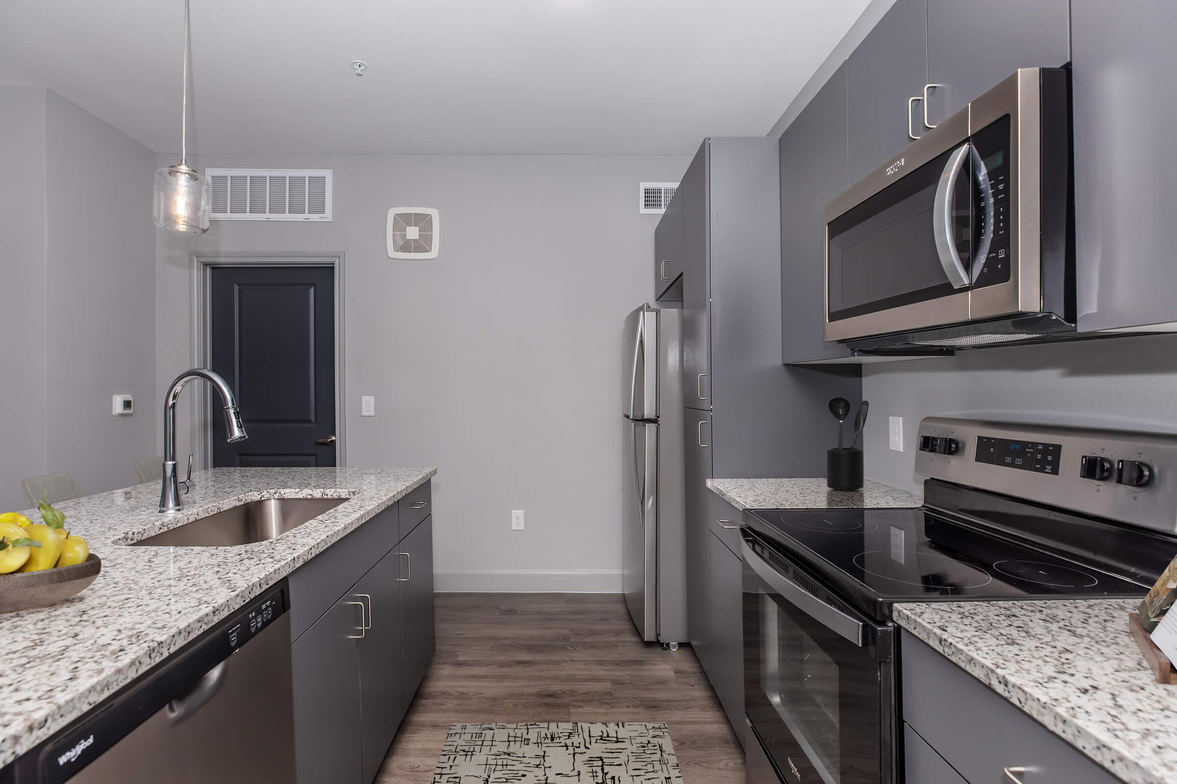 a modern kitchen with stainless steel appliances