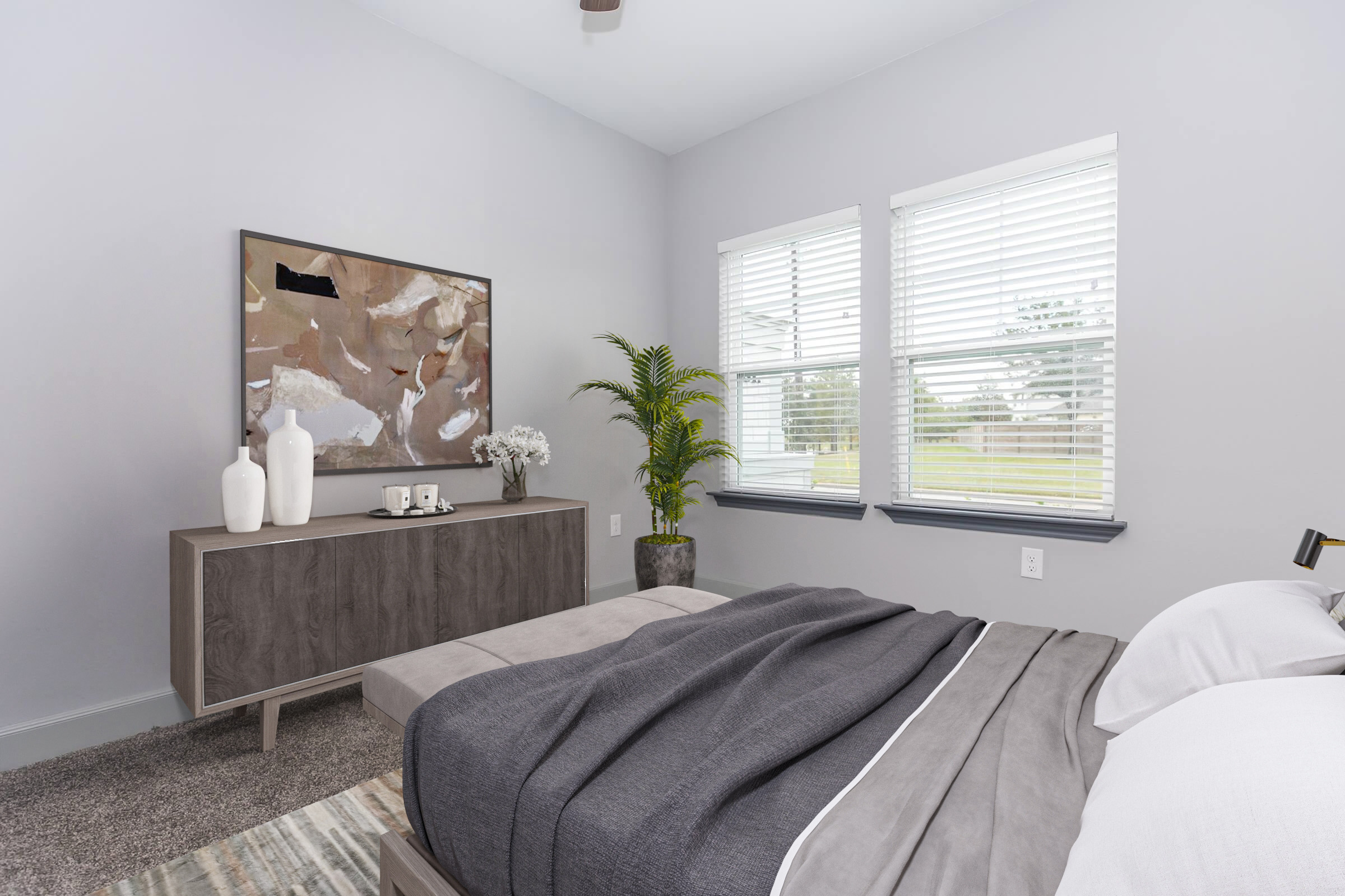 a bedroom with a bed and a large window