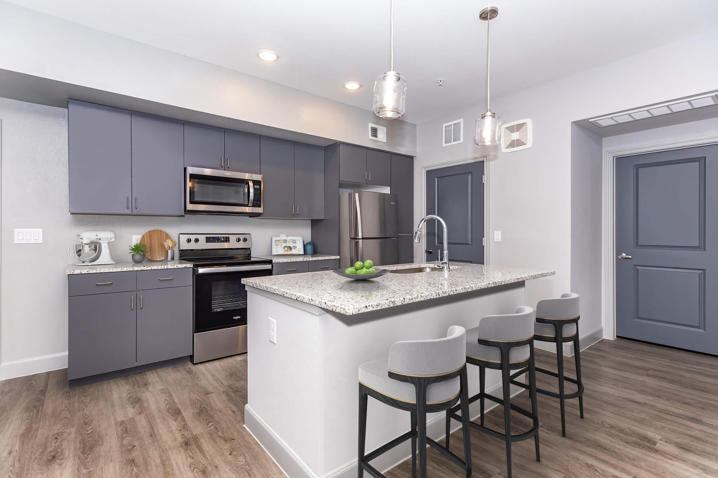 a kitchen with a tile floor