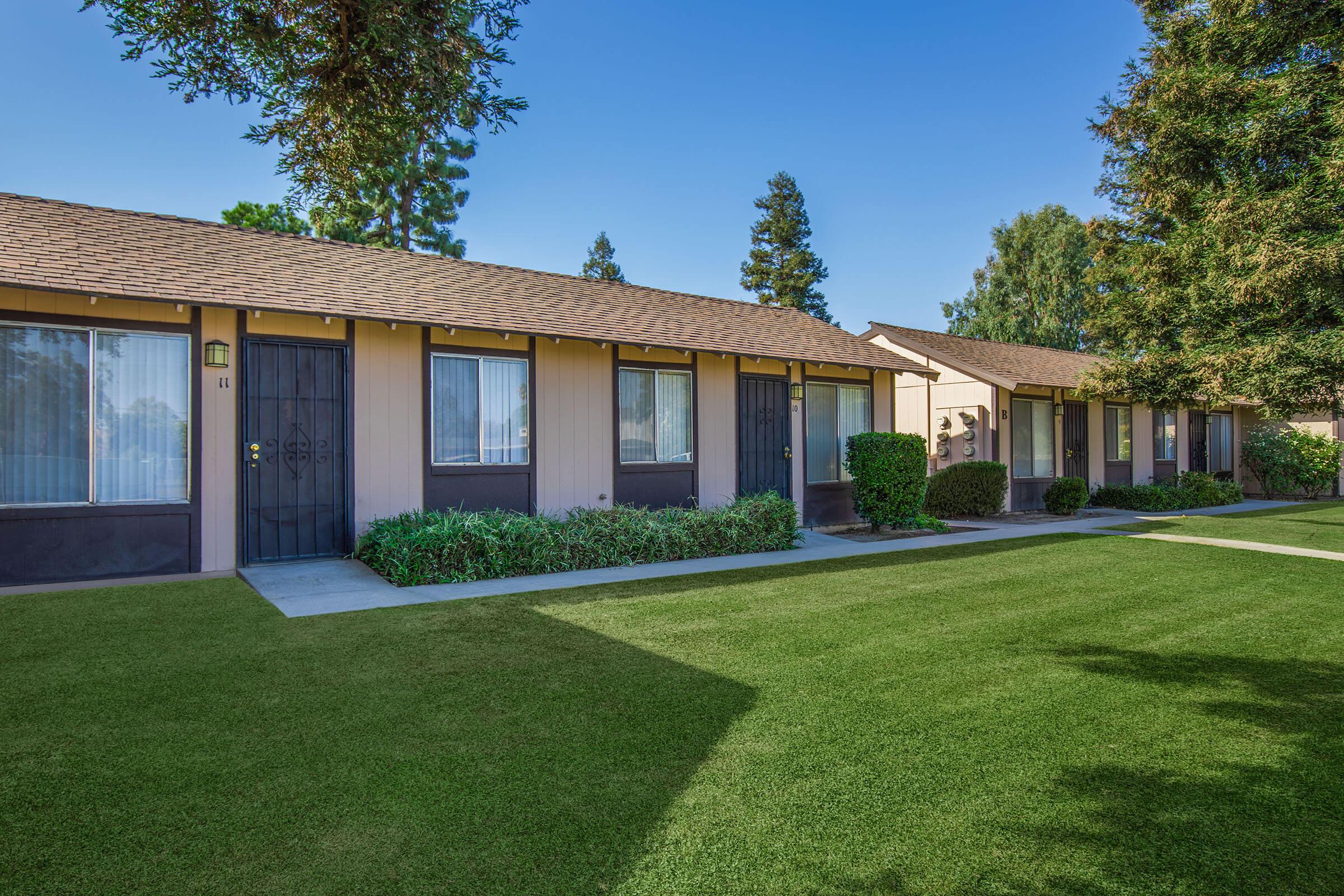 a large lawn in front of a house