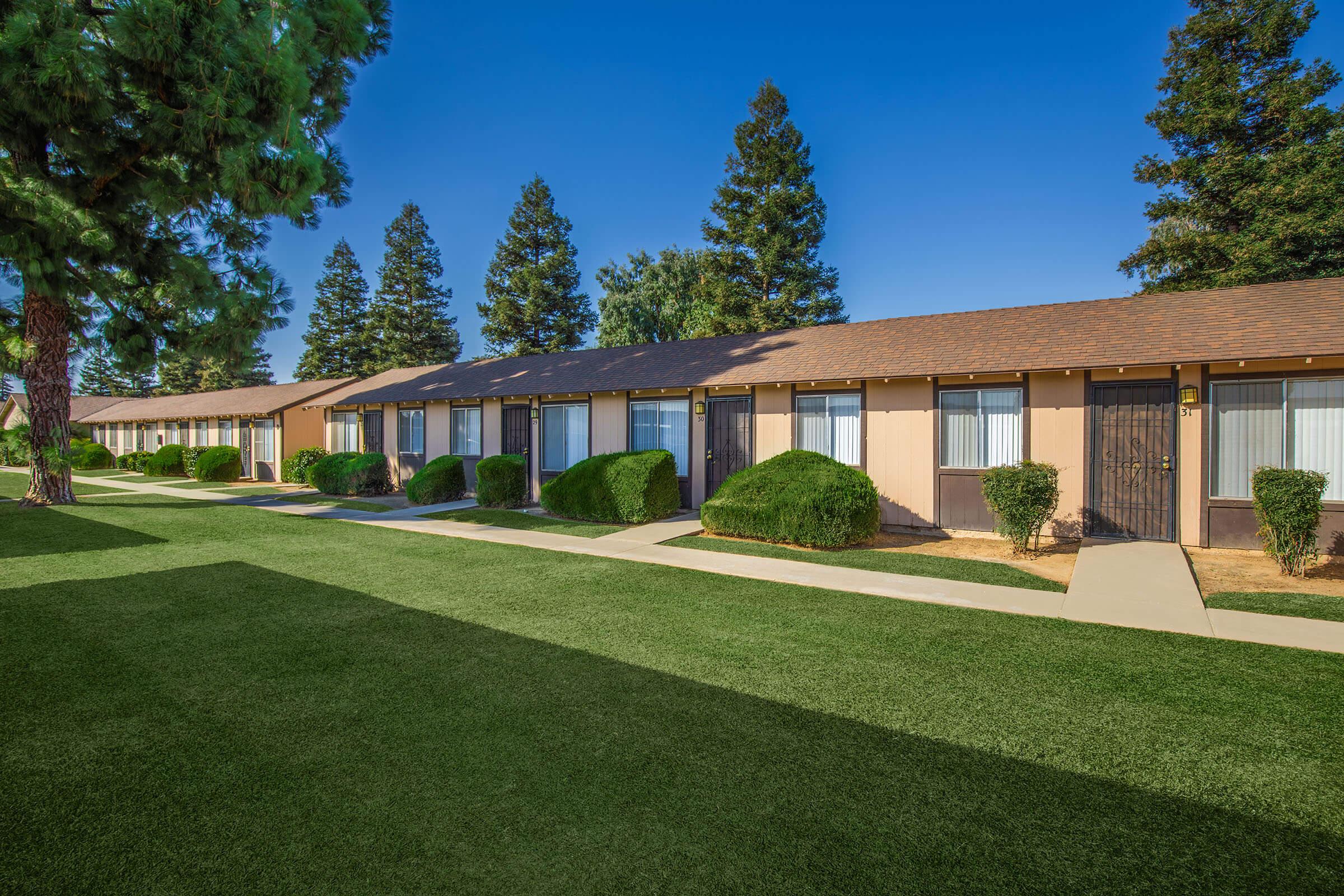 a large lawn in front of a house