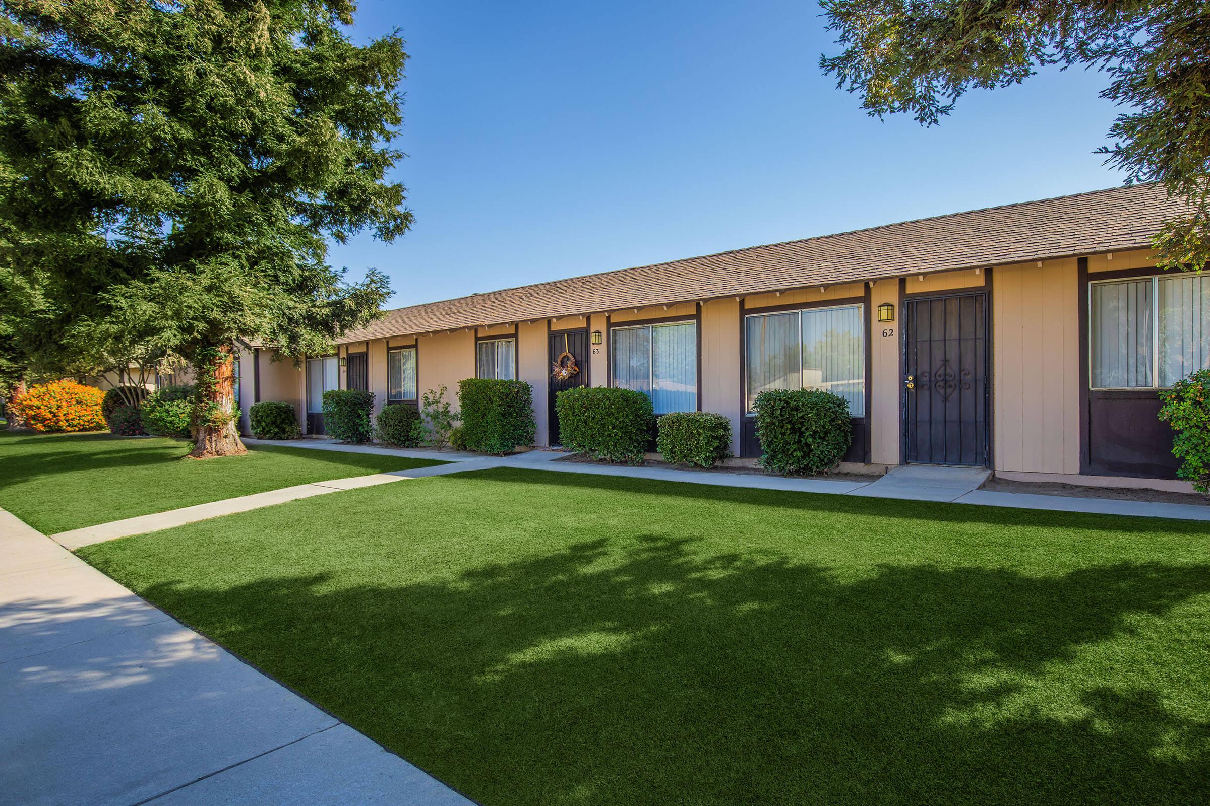 a large lawn in front of a house