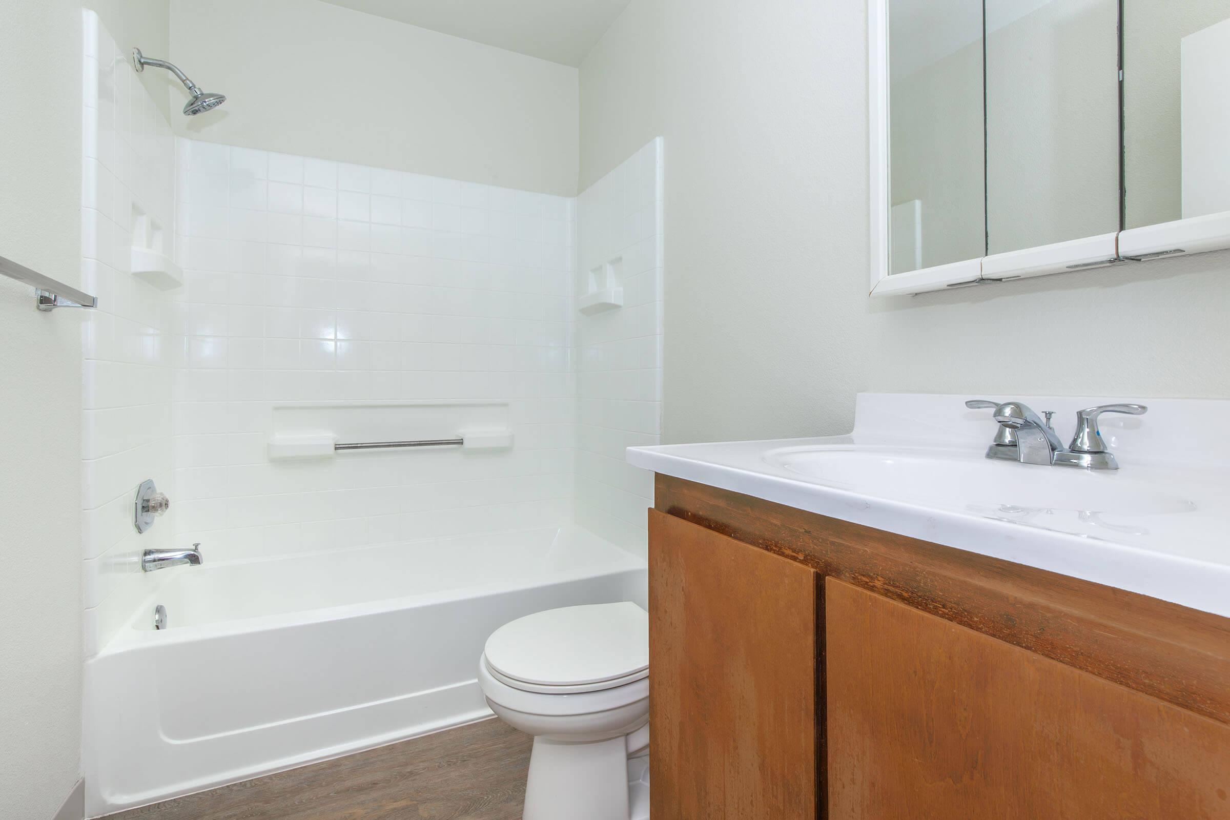 a room with a sink and a shower