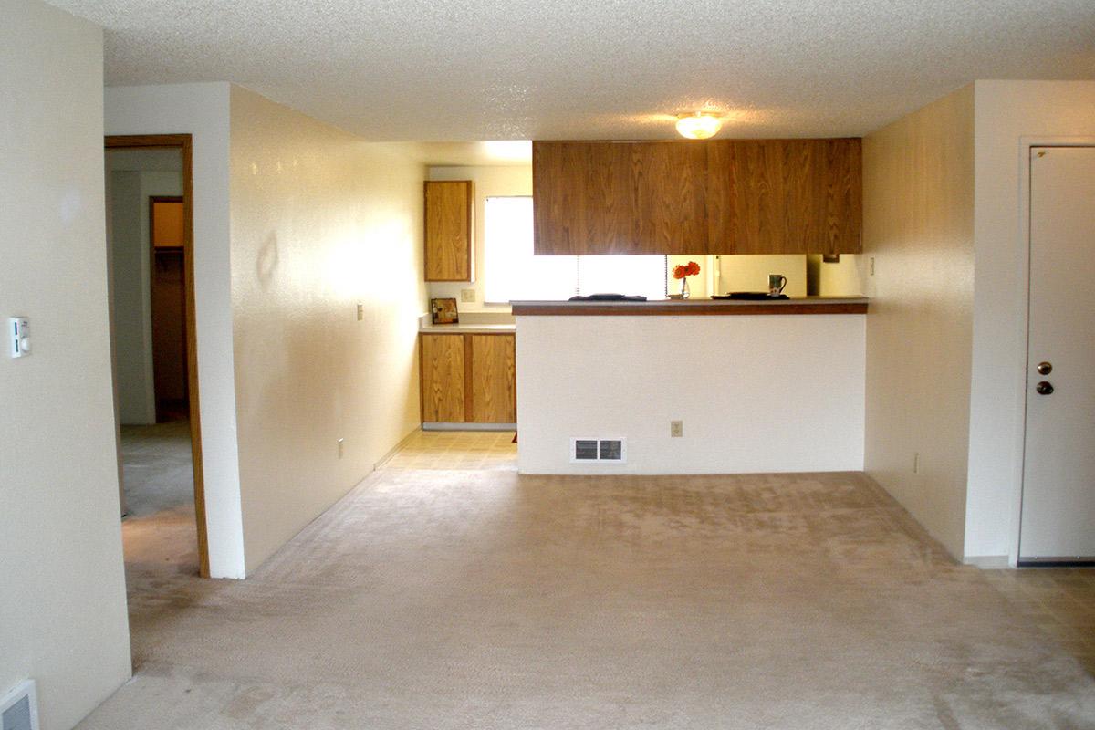 a kitchen with a wood floor