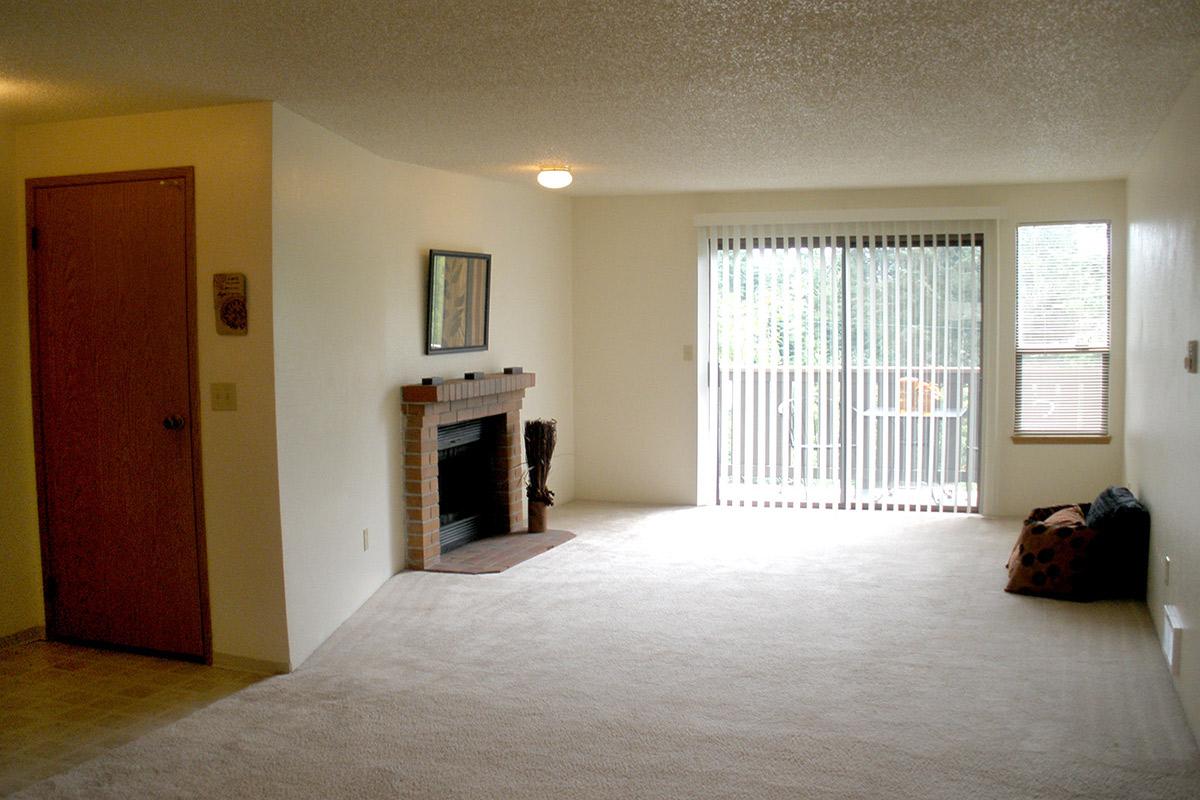 a bedroom with a bed in a room