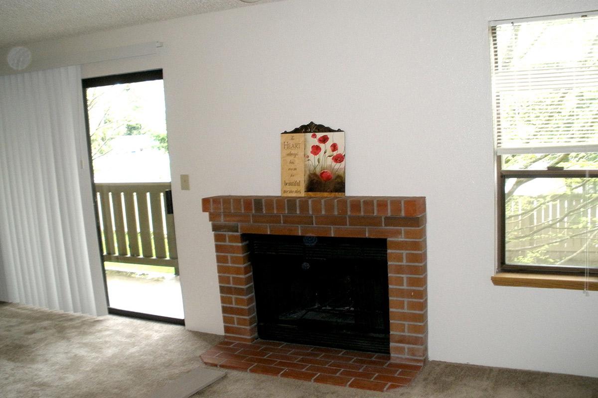 a fire place sitting in a living room