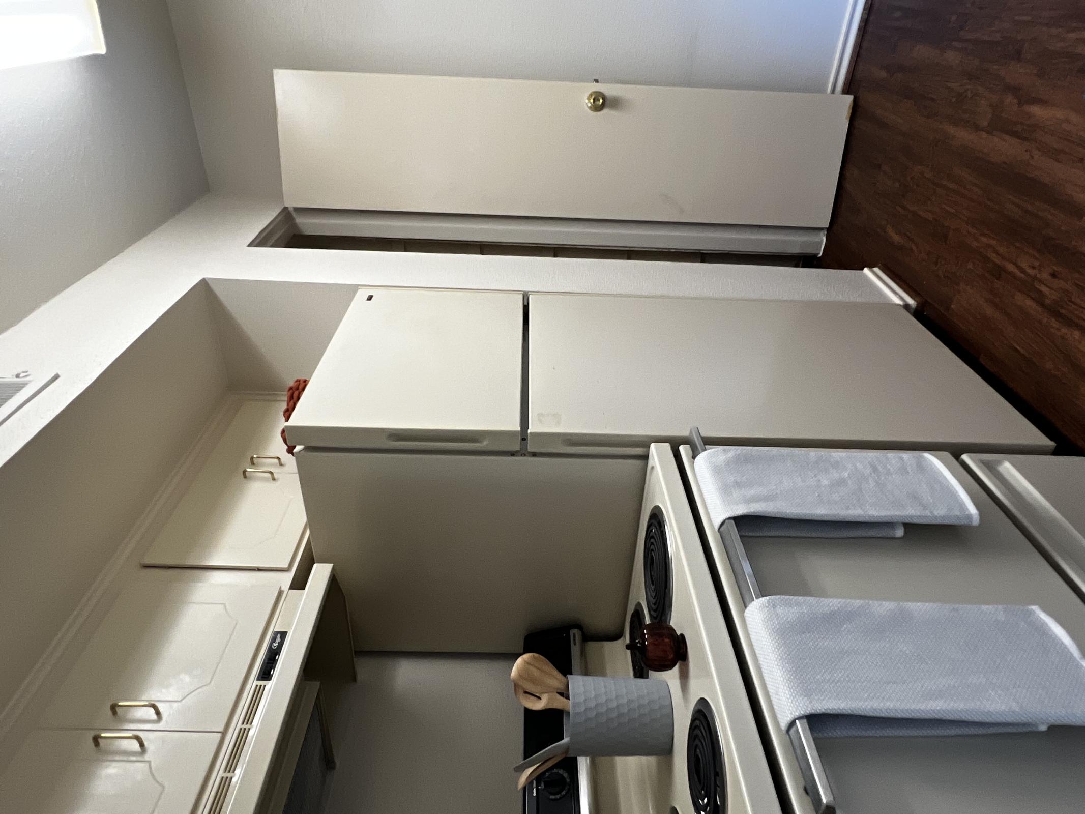 a stainless steel refrigerator in a kitchen